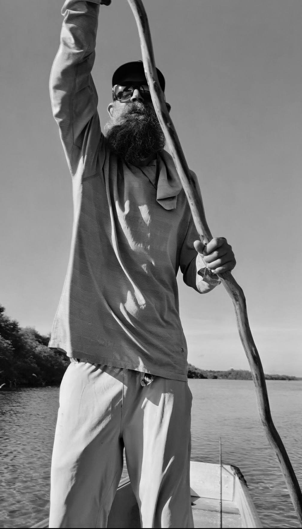 black and white man with deep sea fishing pole 1950s Older Standing In Surf In Waders Holding Fish In One Hand In Other Print By Vintage Collection: Posters & Prints Epic Bahamas Yellowfin bite for