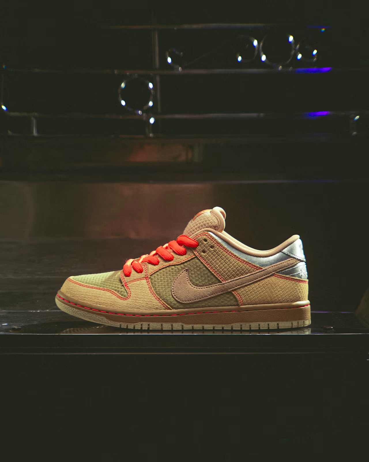 The Nike SB Dunk Low Som Tum Woven panels reference traditional 