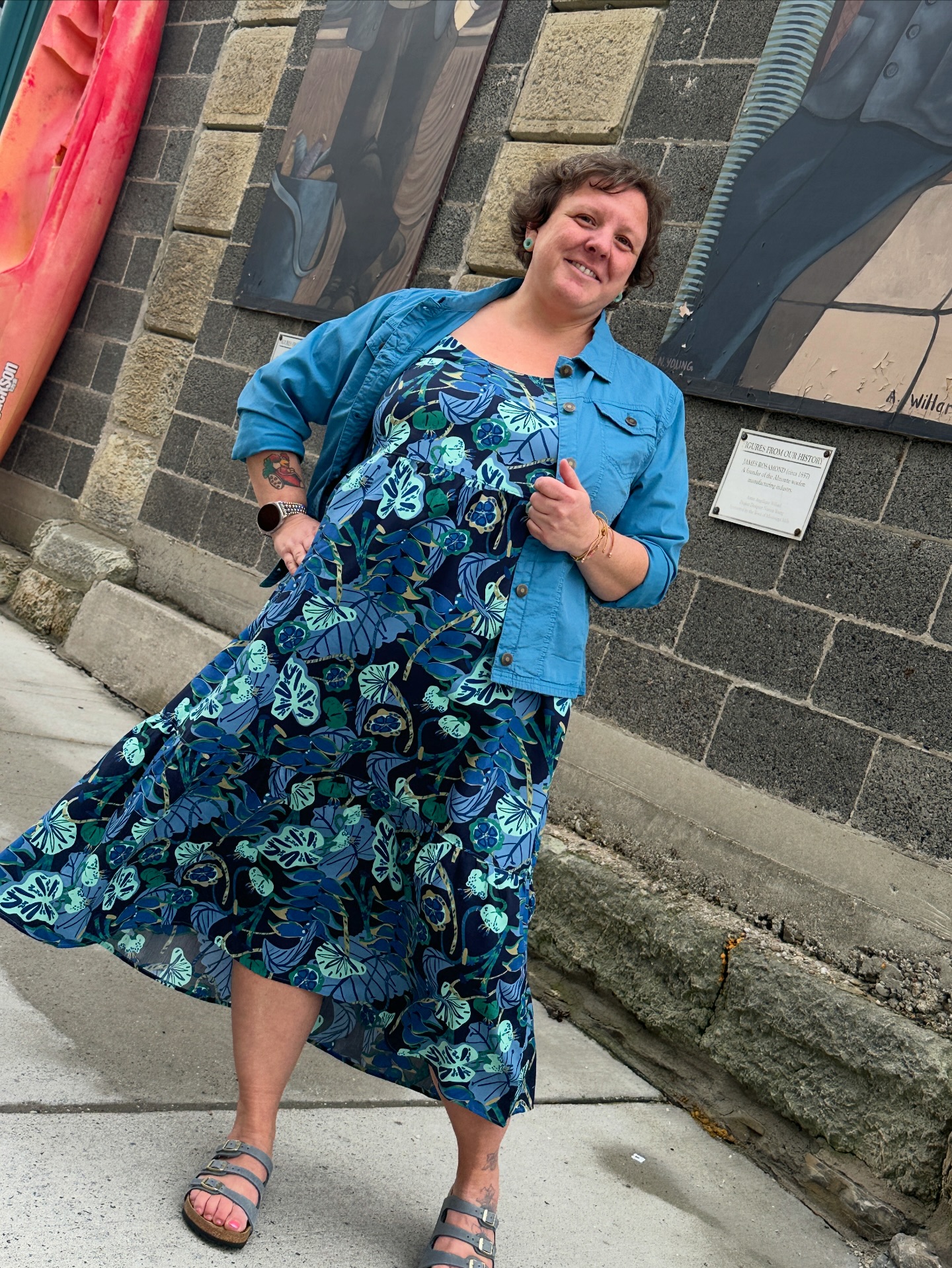 I spy new Birkenstocks. Maggie is radiating in all blue (head-to-toe from Vamos) Dress by Patagonia: https://vamosoutdoors.ca/products/patagonia-womens-tidal-threads-dress-tropiclimb-new-navy Sandal