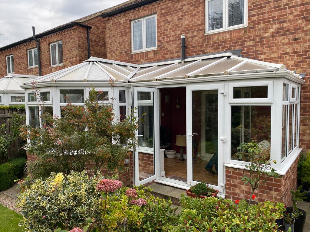 LW Windows - Before and after of a conservatory roof...