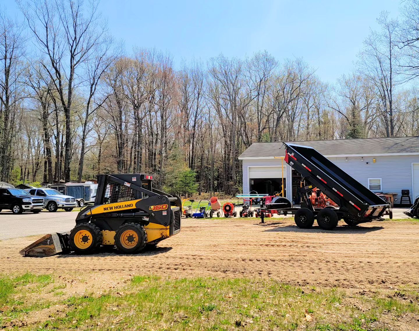 Express Rental - The dump trailer and skid steer are now...