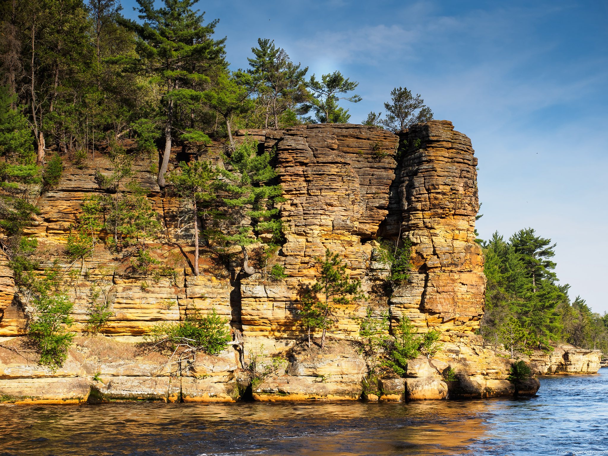 Brian - Layered Cambrian sandstone cliffs carved by powerful meltwater ...