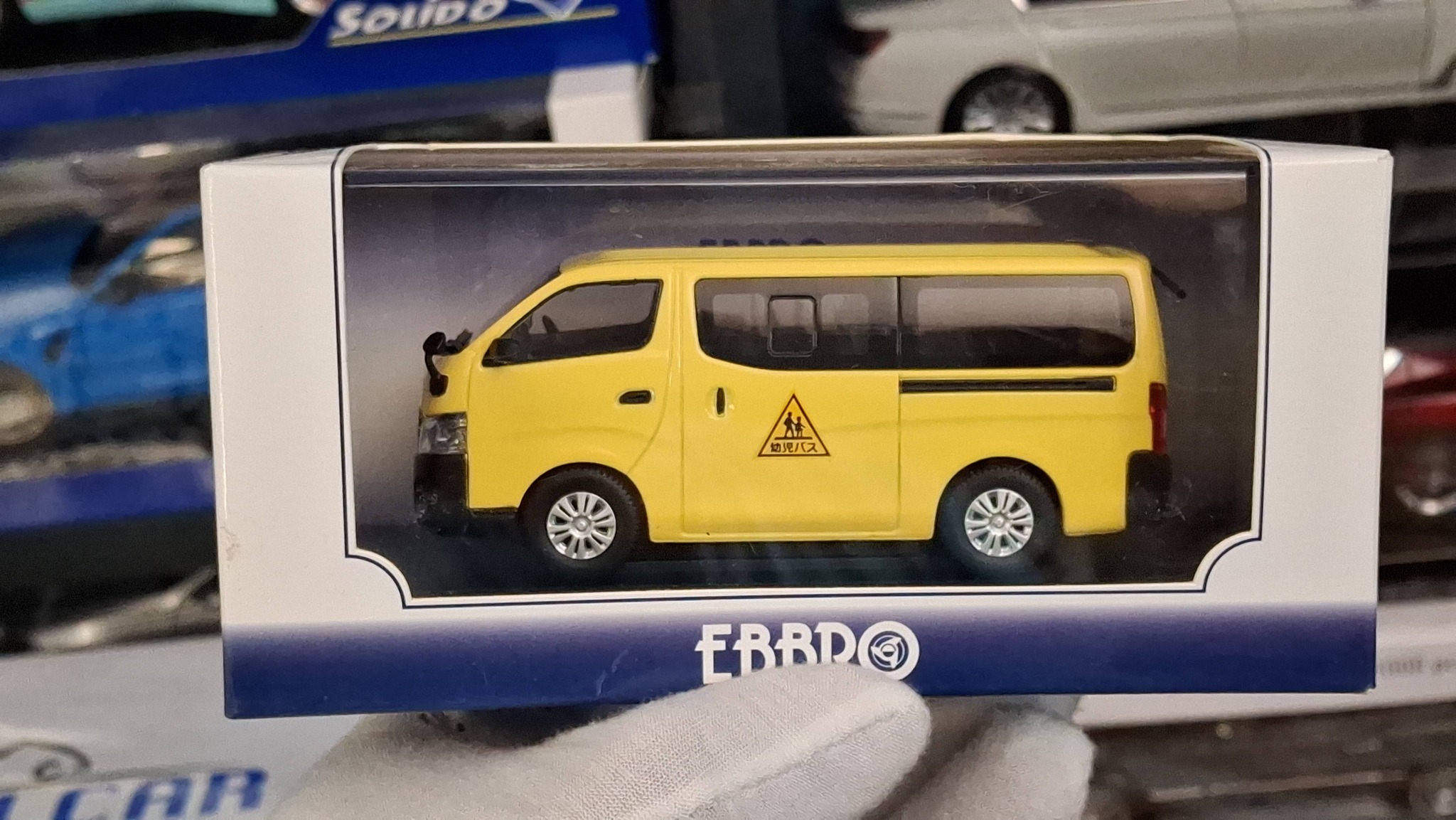 Nissan nv350 caravan school bus 2012 🟡⚫ Ebbro 1/43