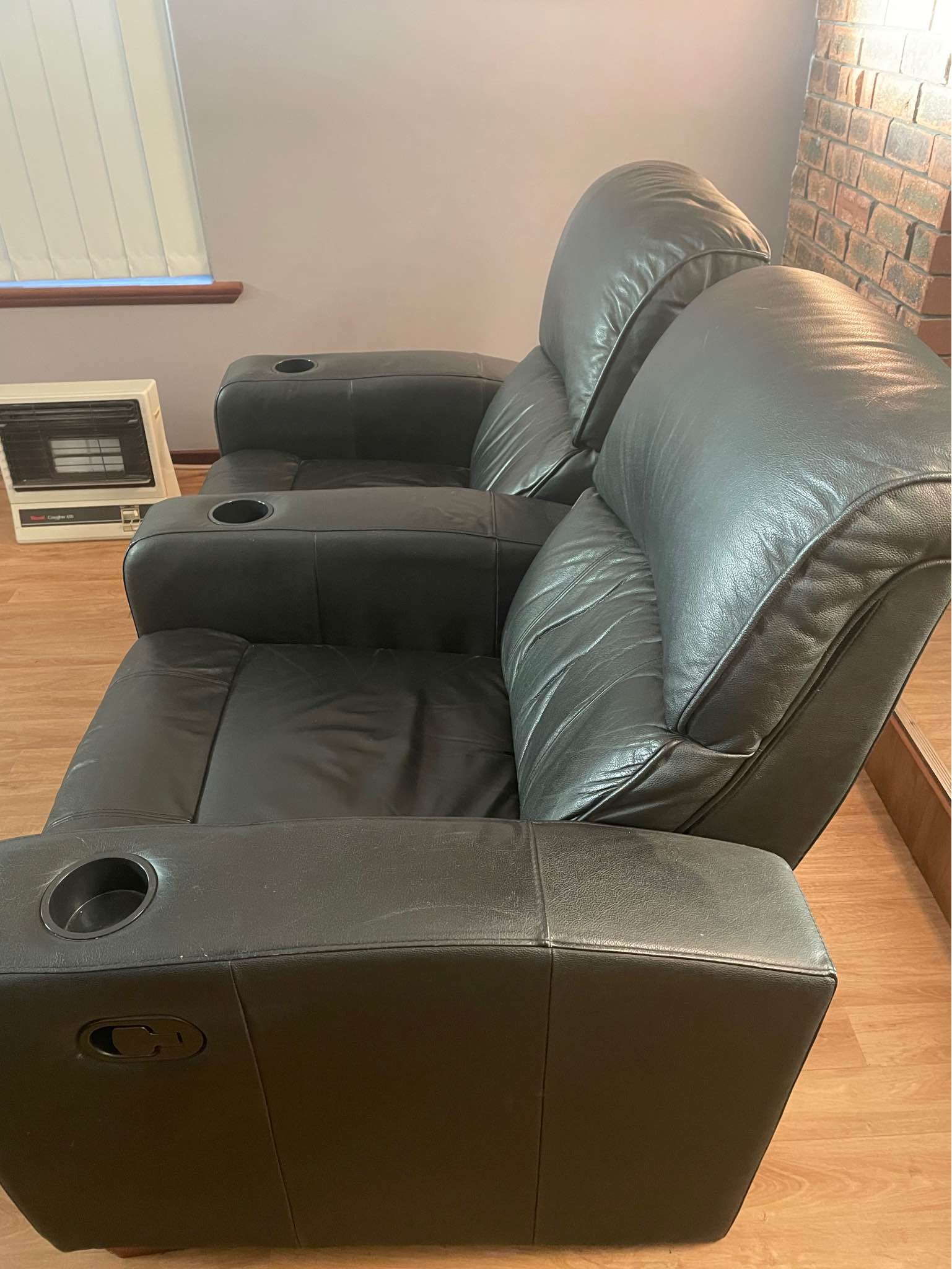 Real Leather black interlocking recliner chairs in excellent condition ...