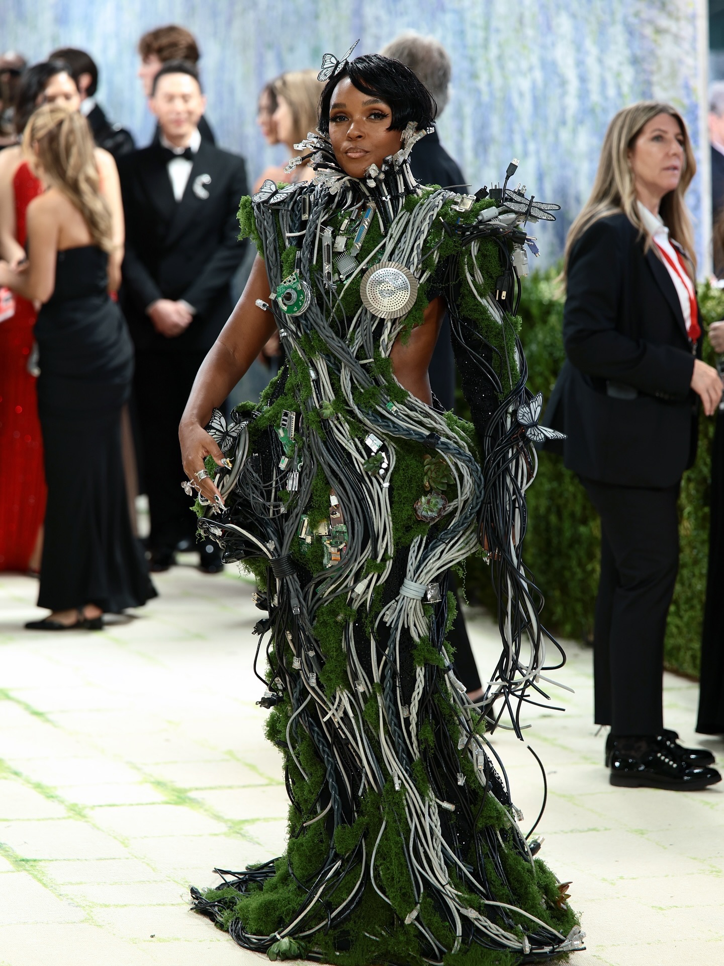 met gala green dress Some people interpret the theme. Janelle Monáe becomes the thesis. At the 2026 Gala, @janellemonae arrived with a nature-forward, animatronic look that transformed the carpet into a living gallery. Green, kinetic zuhair murad green dress