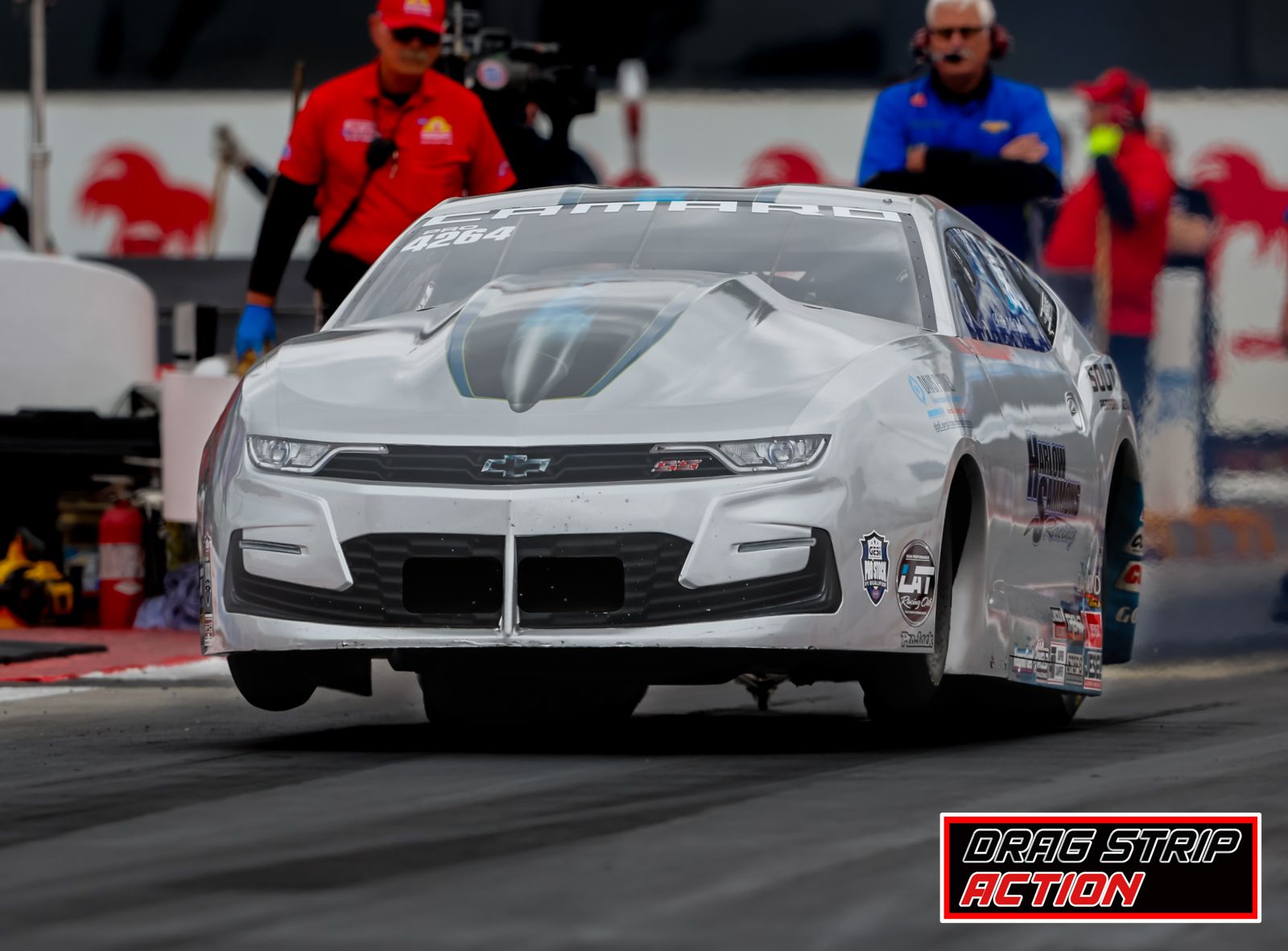 Drag - Chris McGaha with the #wheelsup at the 65th annual Lucas Oil ...