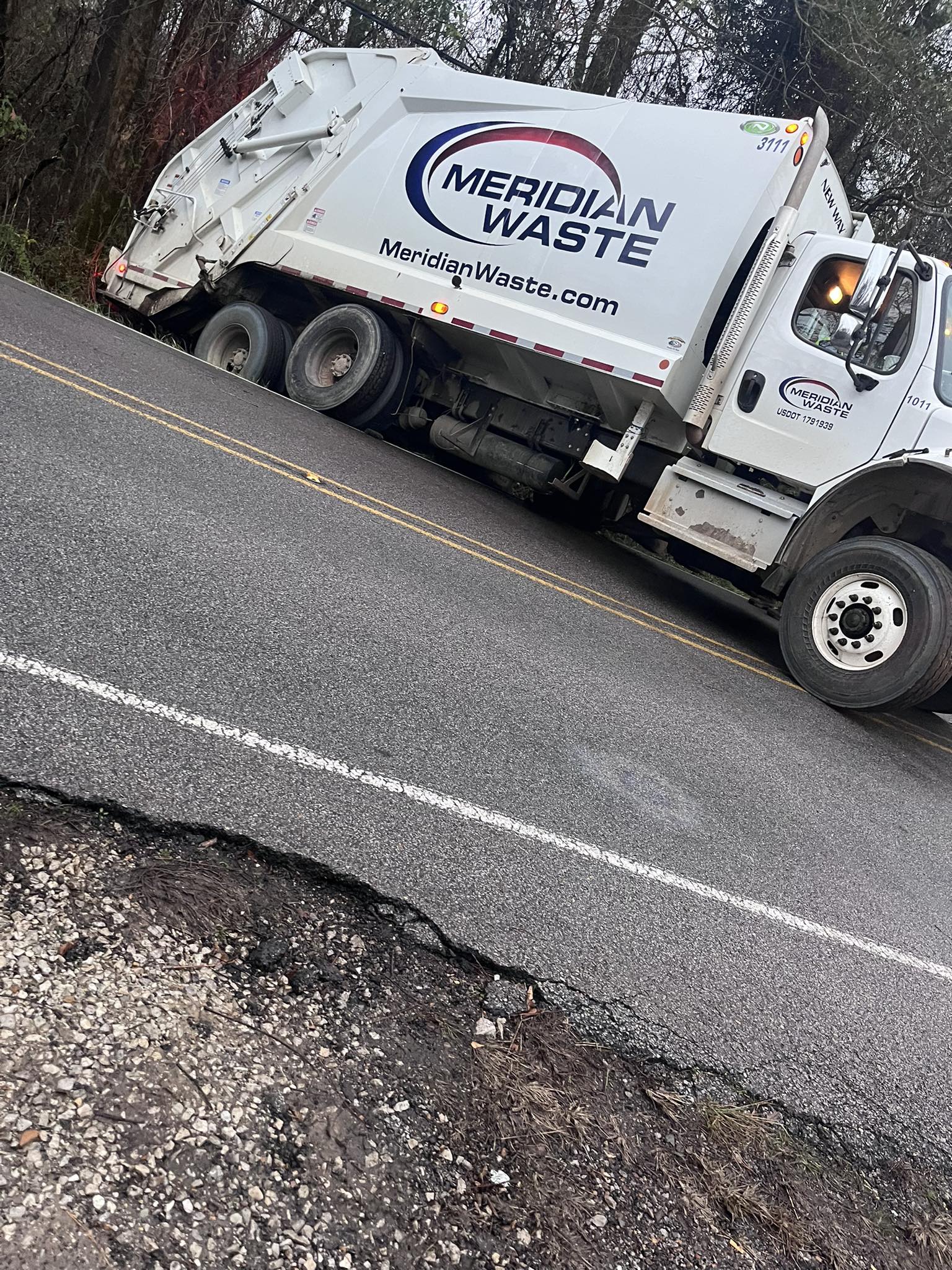 Scotty - Meridian Waste Truck in the ditch earlier this morning. The ...