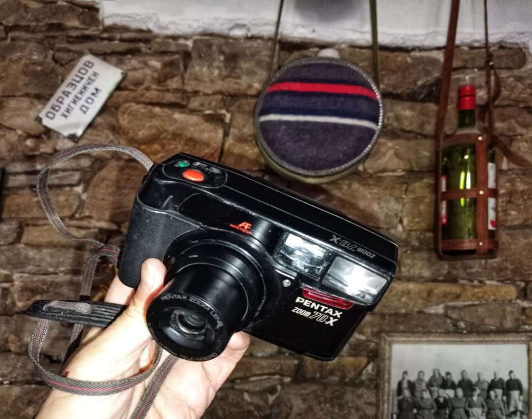 Today's camera from the collection is this Zoom 70-X. Manufactured