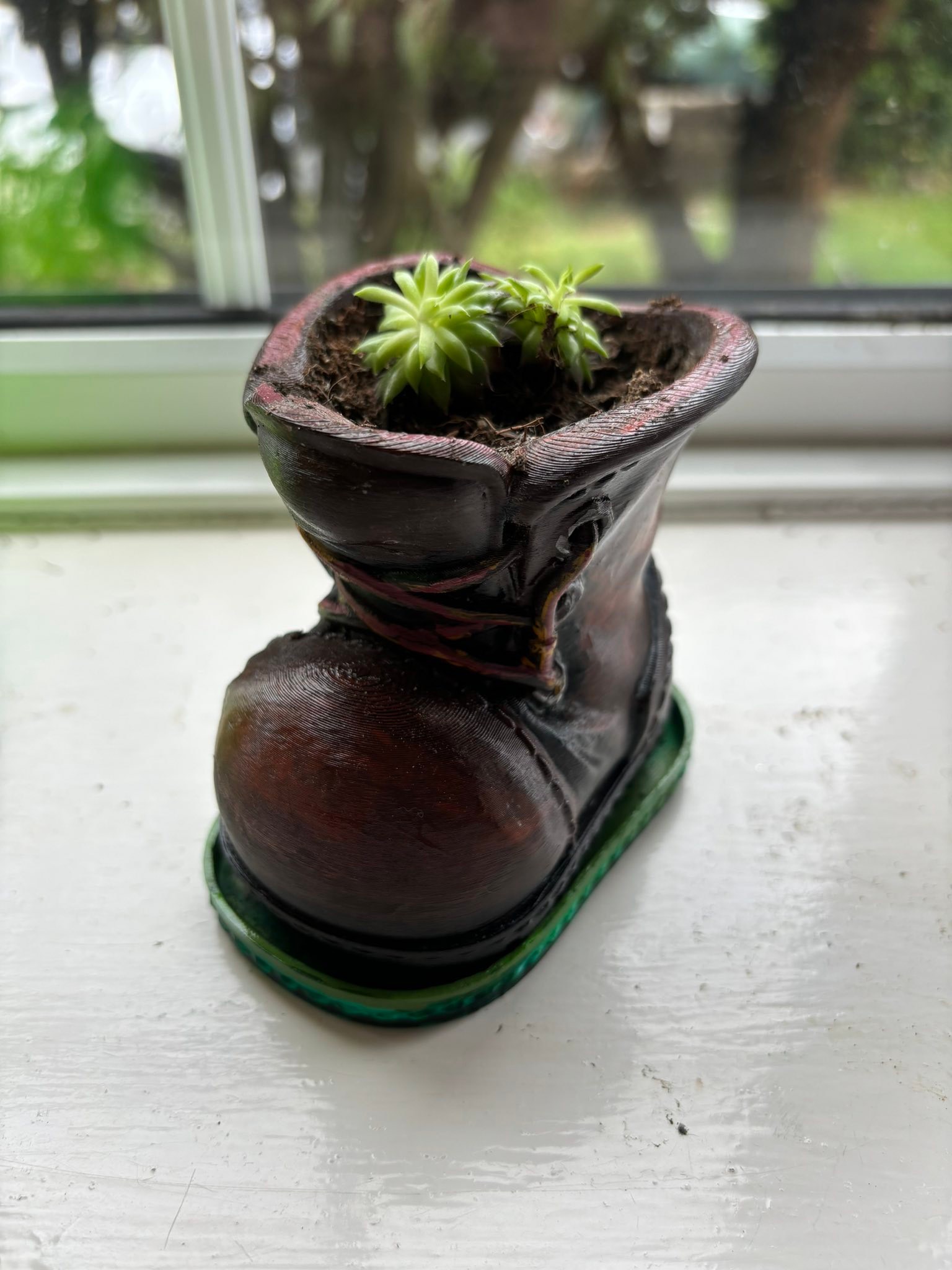 This Frog and little boot planter are a couple of my fun pieces, I
