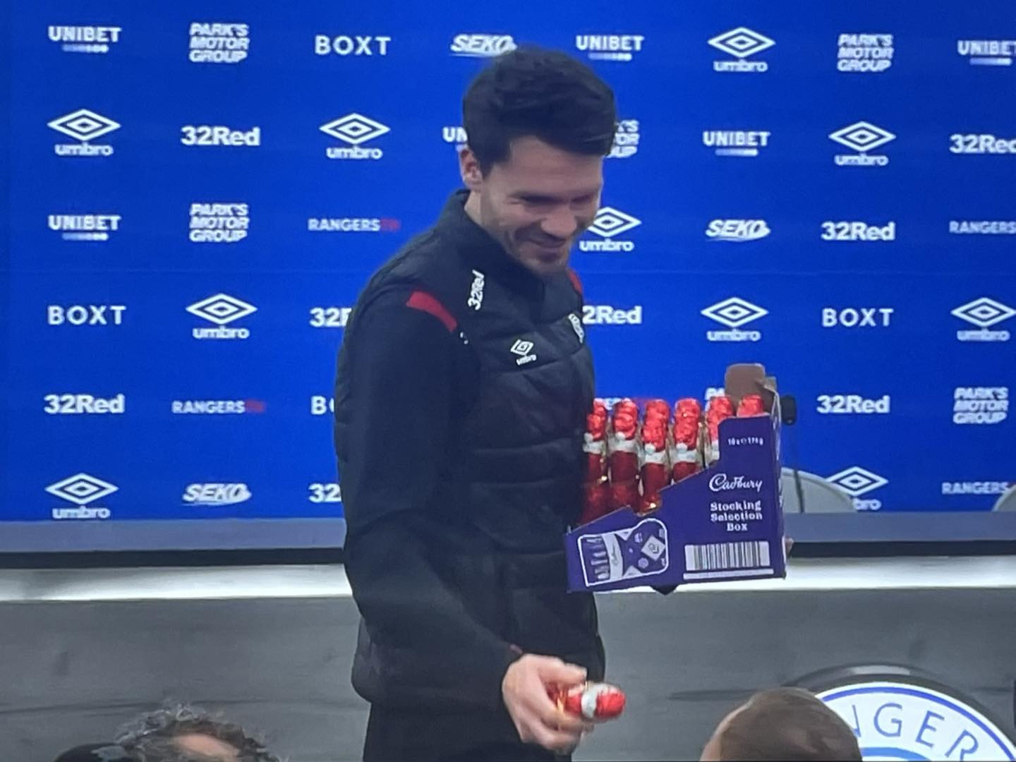 Ibrox - Our very own Santa giving out choccy gifts to the journos. Nice ...