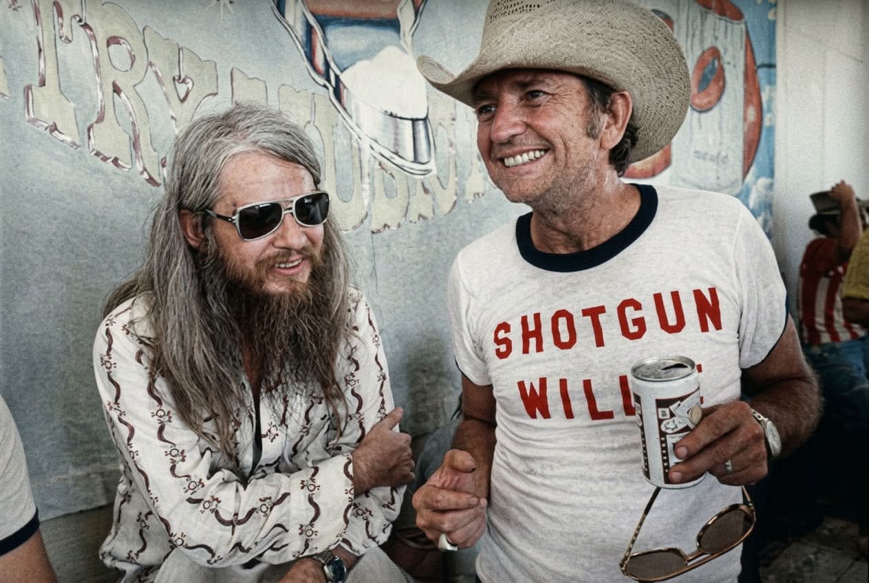 That iconic photo features Leon Russell alongside Willie Nelson