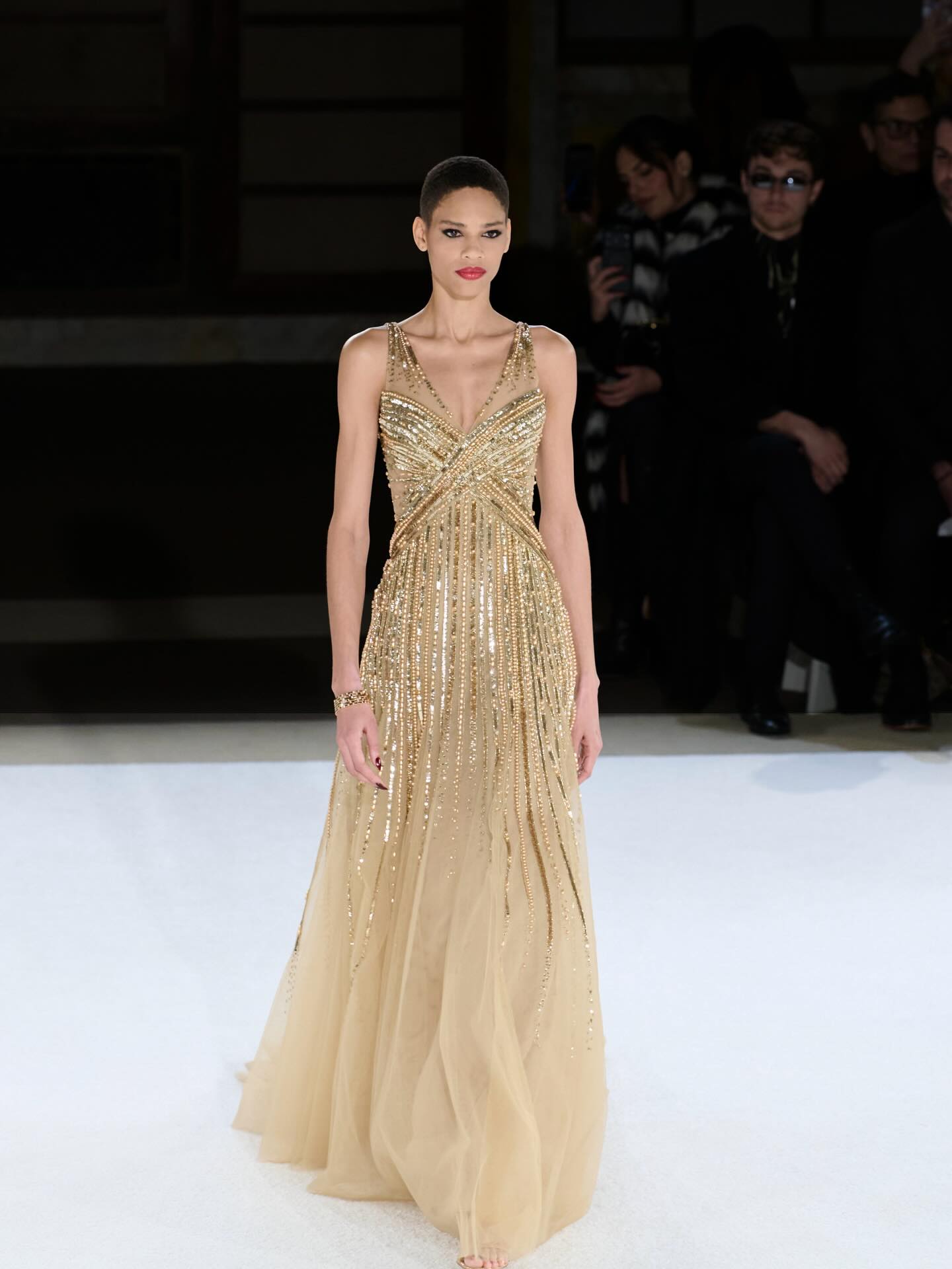 classic gold dress Gilded with pearls and linear sequin embroidery, our vintage tulle gown blends intricate embroidery with understated glamour. Enter the world of our latest collection at pamellaroland.com Jewelry: @chopard Makeup: @artistry Makeup style silhouette