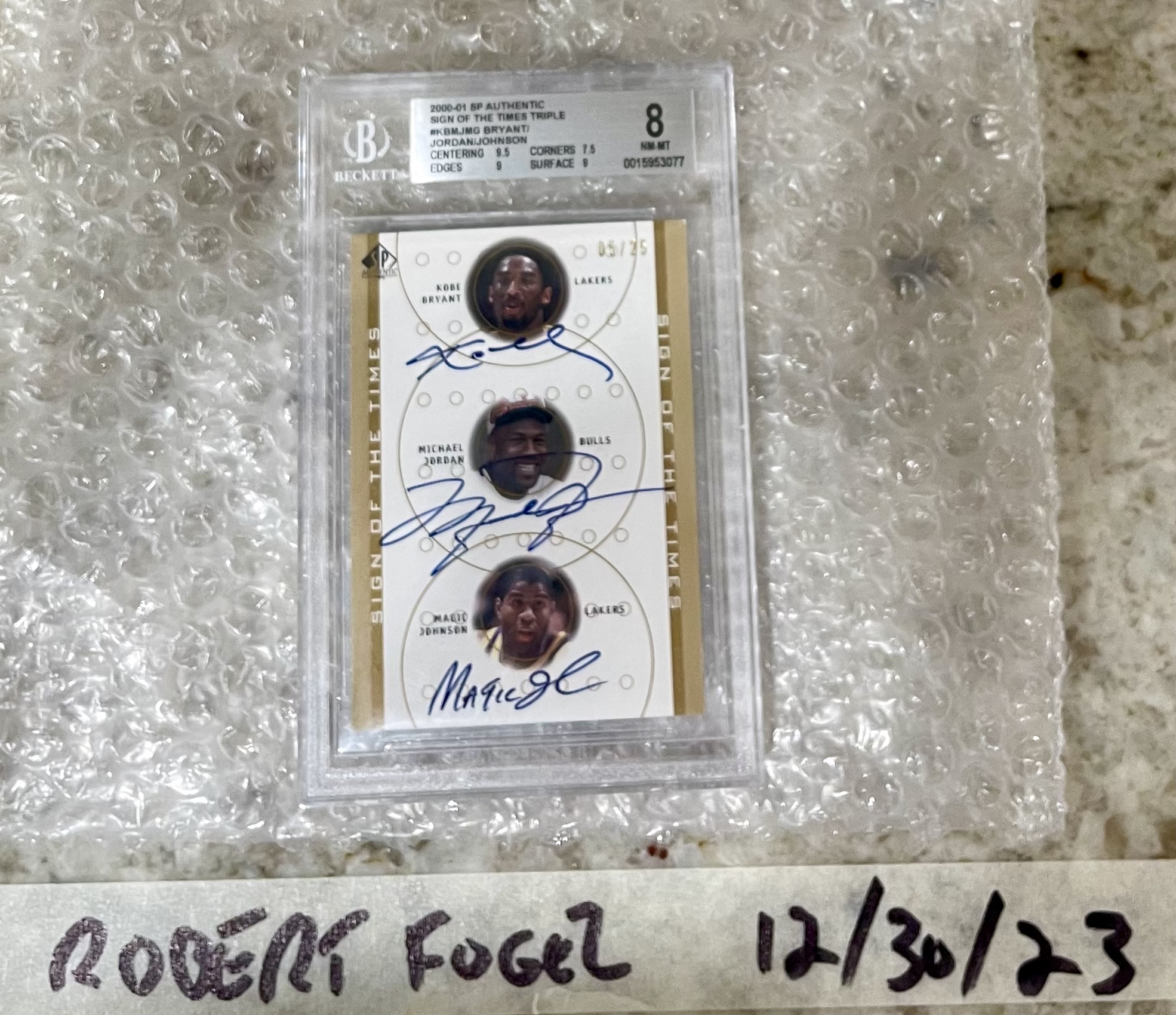 Kobe Bryant/Michael Jordan/Magic Johnson 2000 SP Authentic triple 