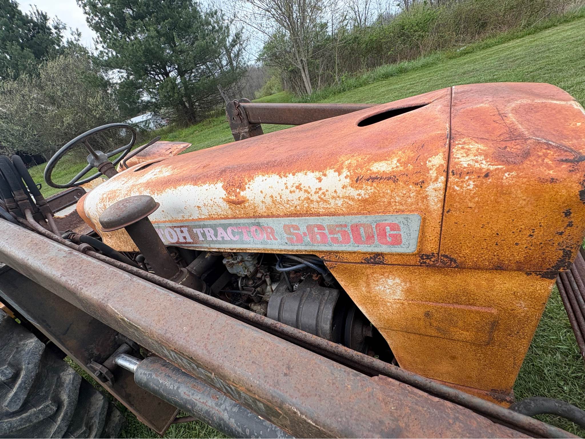 Two tractors a grater blade bush hog and a finish mower one needs a ...