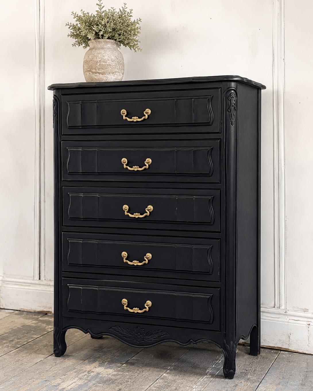 🖤 NEW ARRIVAL from Second Chances! 🖤 This gorgeous black vintage dresser just arrived at our North Aurora location! With its classic detailing, beautiful curves, and gold hardware, it's a stunning statement