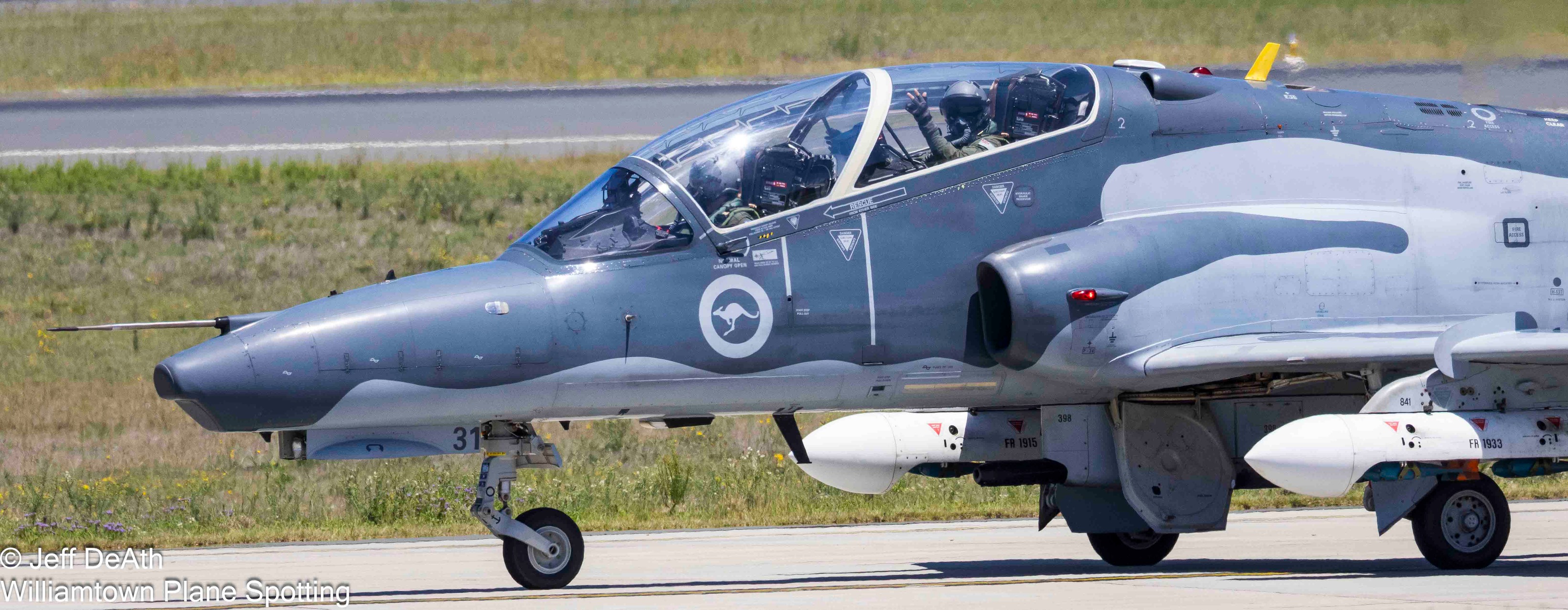 Williamtown - Hawk Pilot Instructor (backseater) waves to the Fighter ...