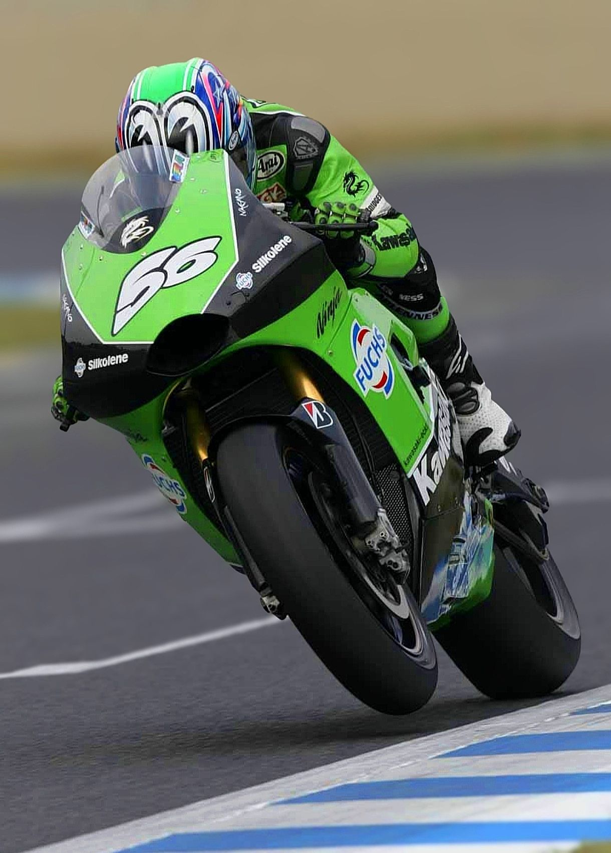 Shinya Nakano riding green Kawasaki Ninja ZX-RR at MotoGP