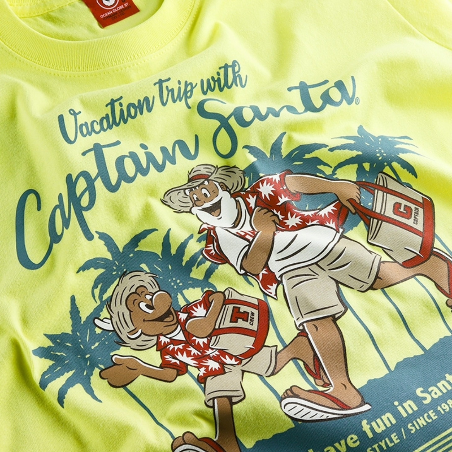 キャプテンサンタの半袖Tシャツ🌴☀️ 前面には、バカンスを楽しむ