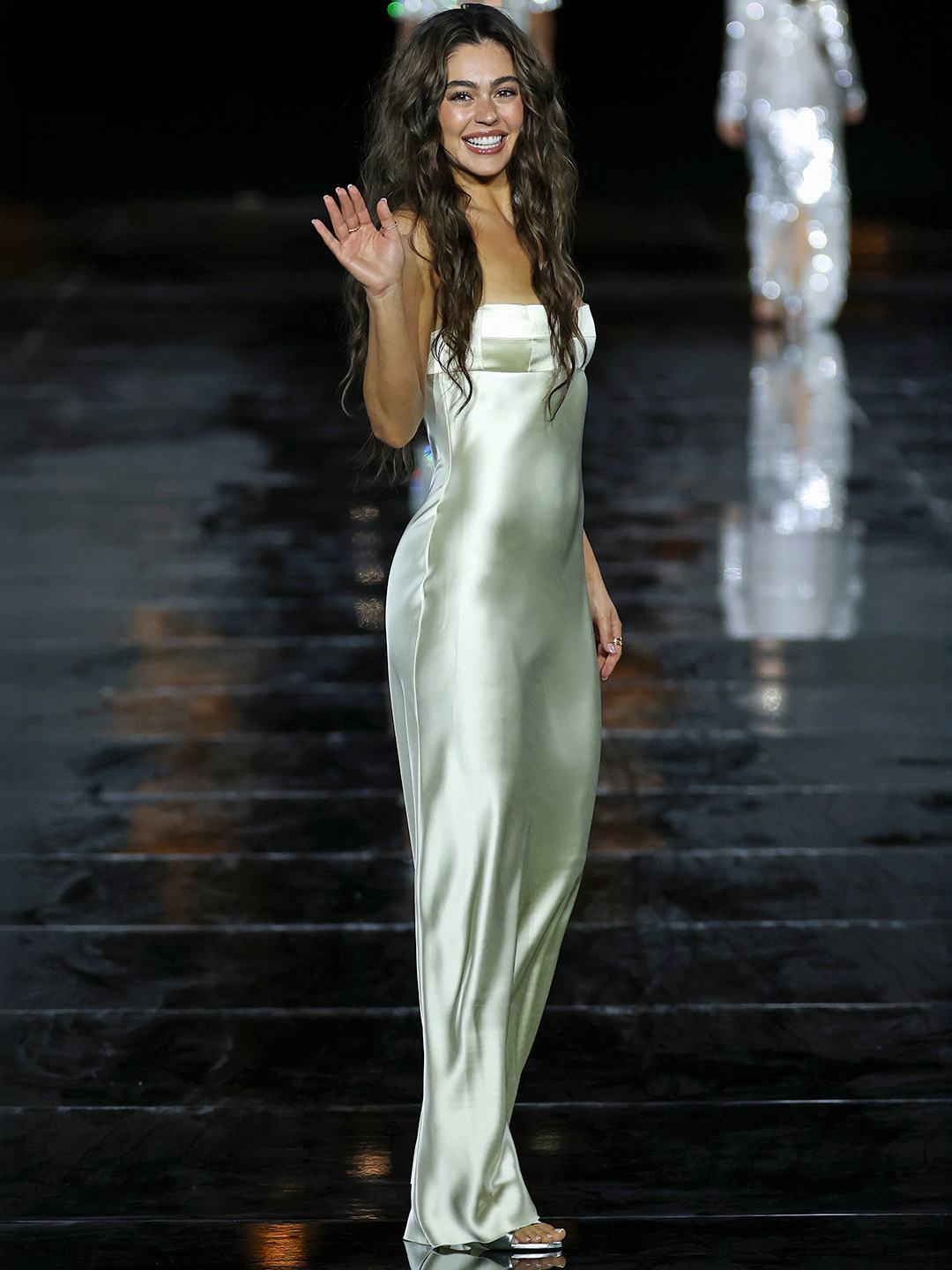 Selena Gomez is lovely in lilac in this silk slip dress that's part of her latest Coach collection. https://et.tv/2wL1hSY