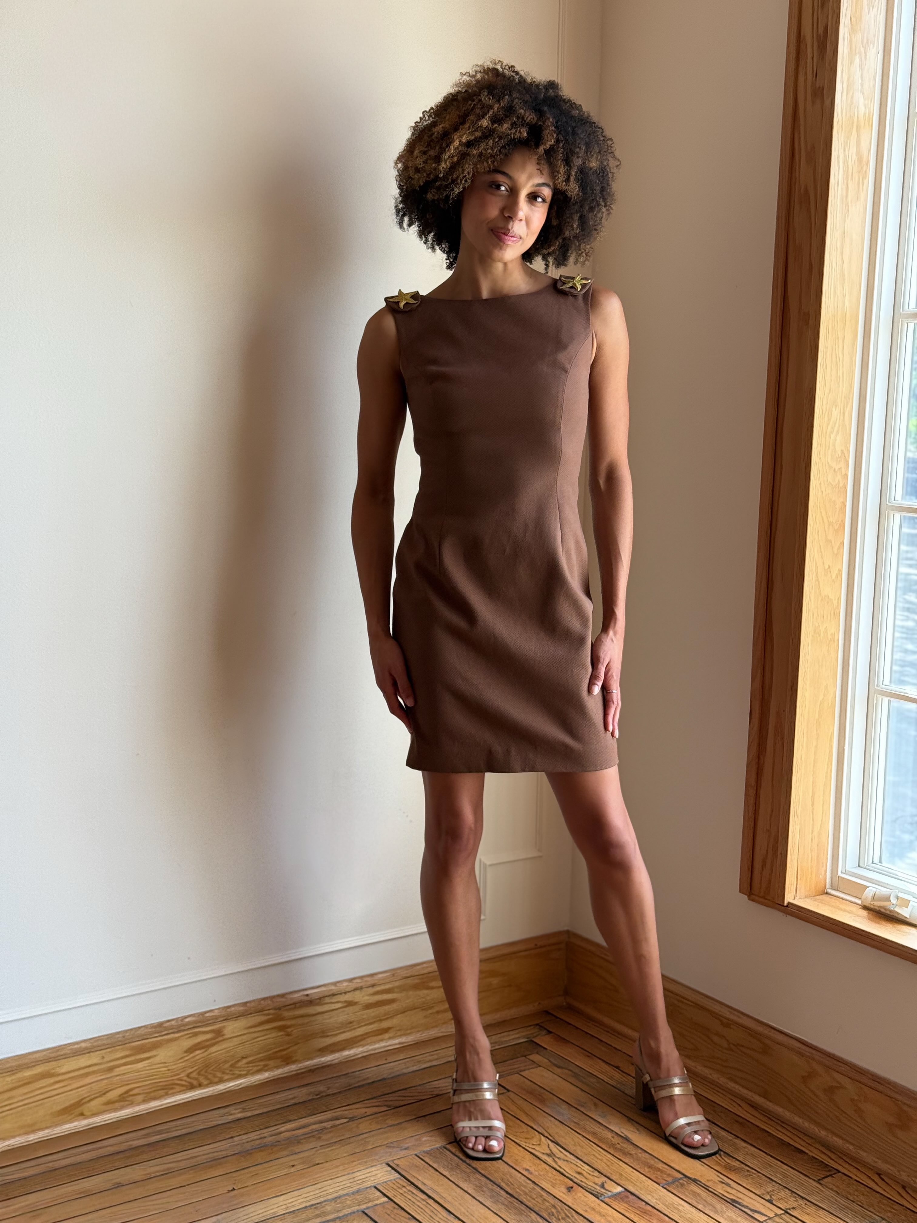 Brown shift dress with gold starfish embellishments at Plume boutique