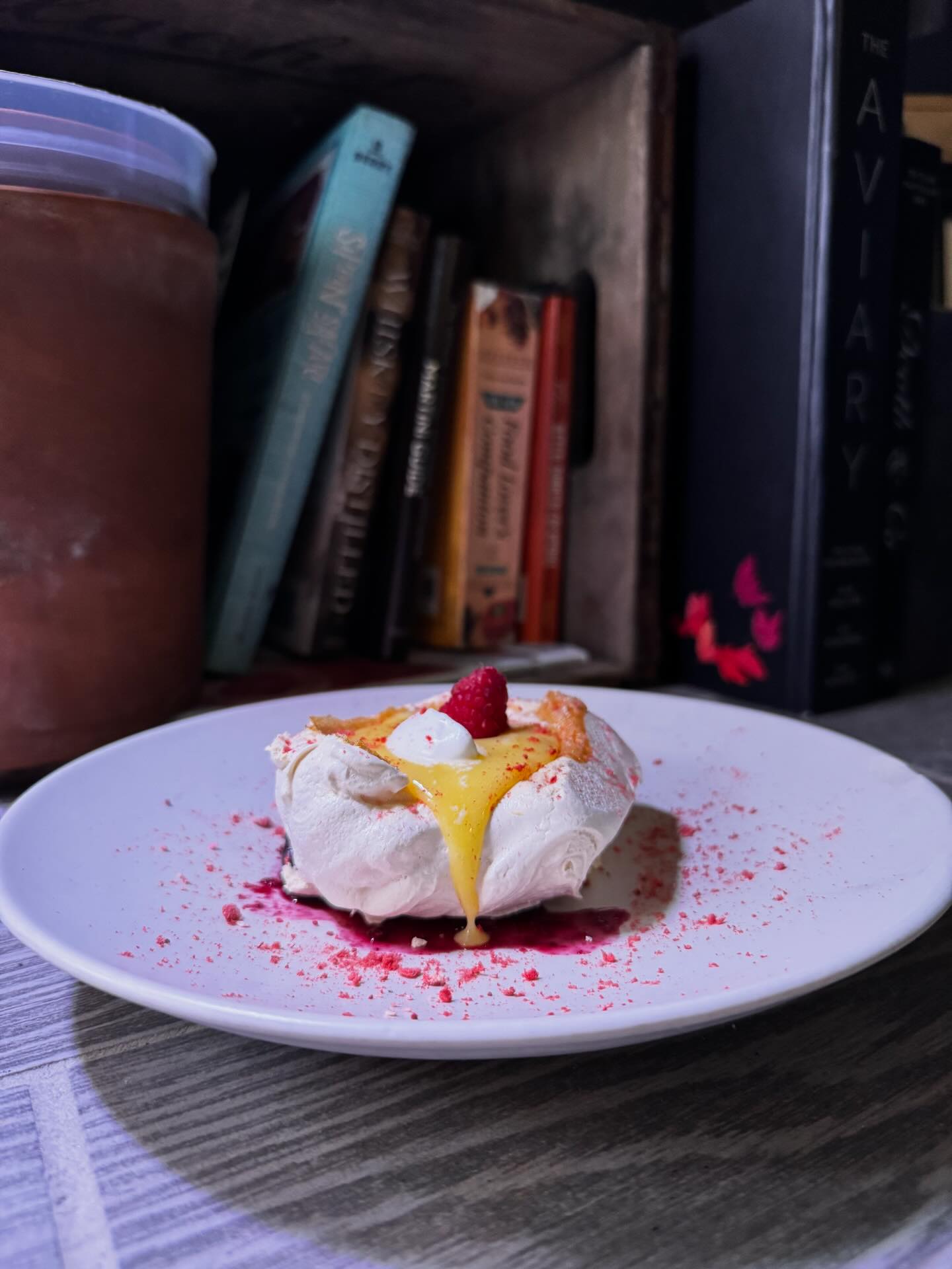 Wren - Pavlova - lemon curd, blueberry syrup, raspberry, freeze dried ...