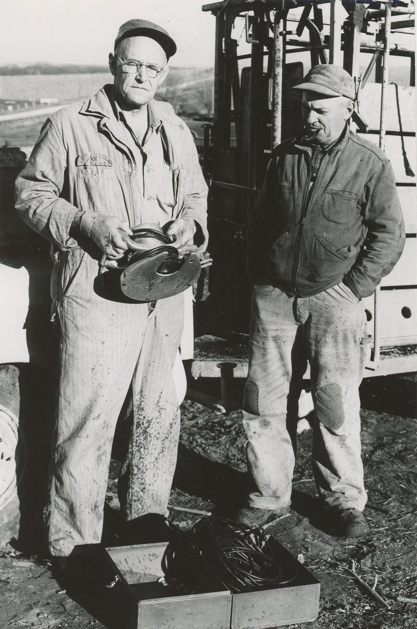 Traer - Who are these men? A livestock chute behind them but no idea ...