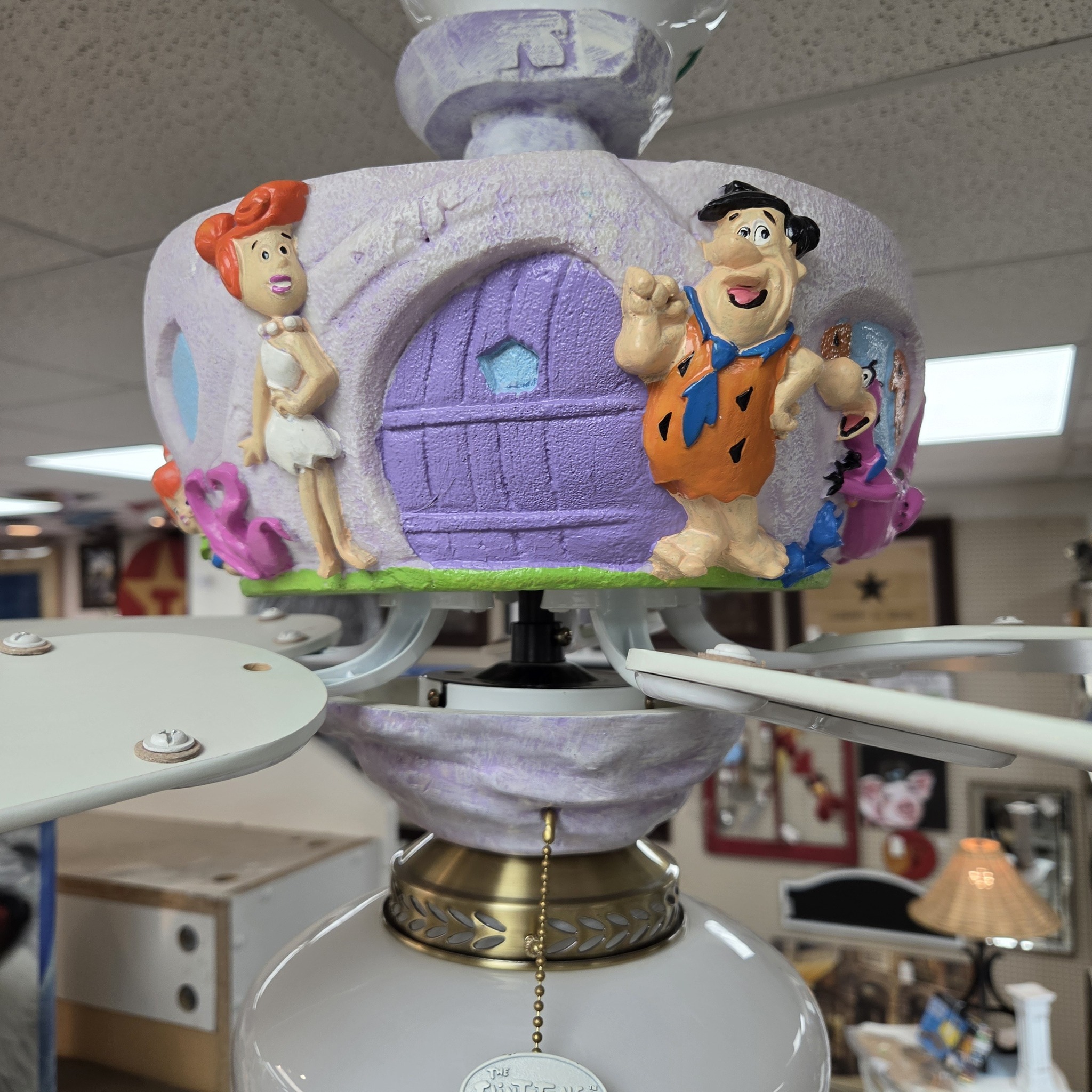 Assembling a vintage Flintstones collection with all its pieces