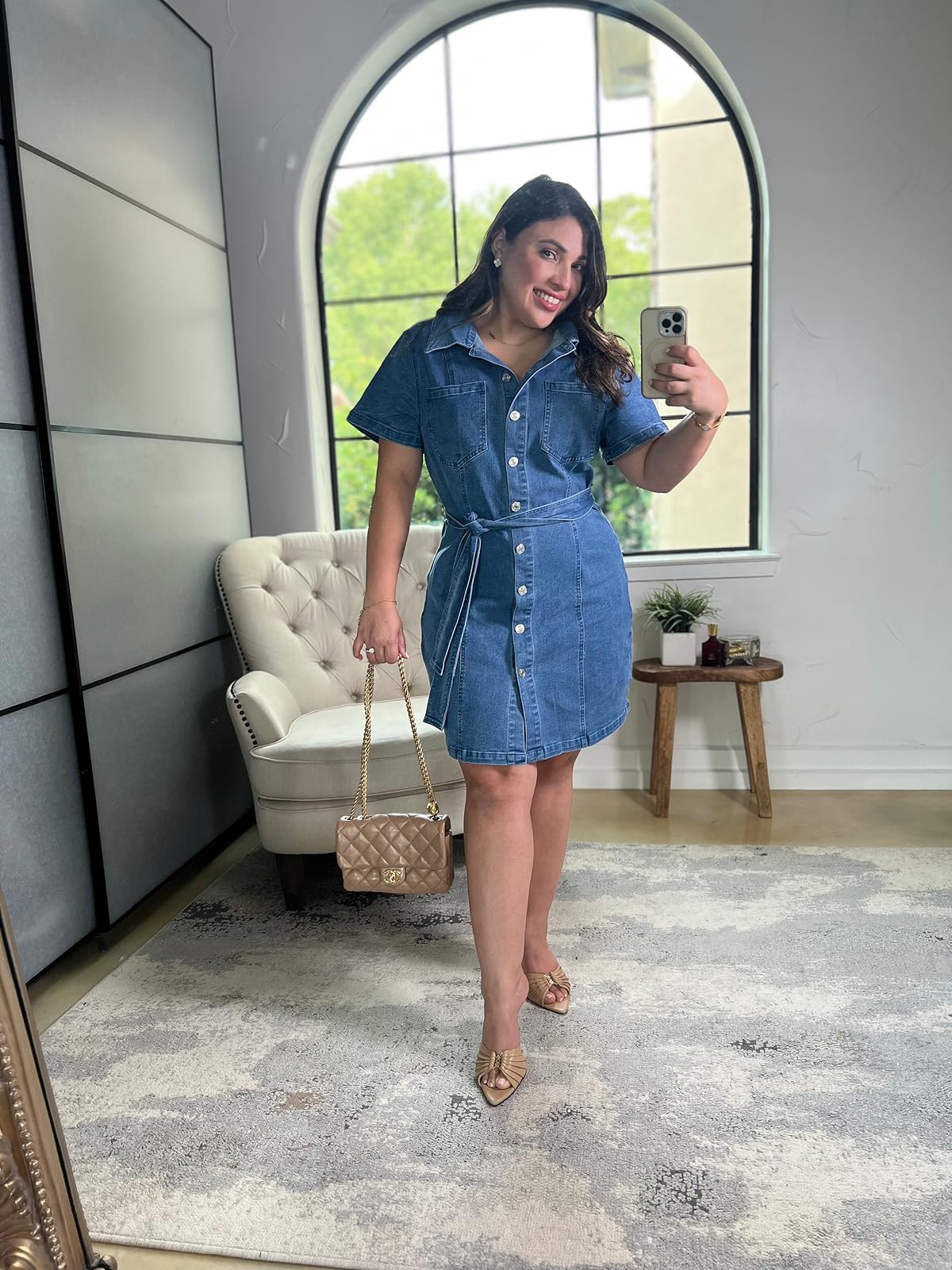 A denim dress made for soft spring. Styled with nude heels, a classic bag, and gold jewelry to elevate the look. It runs big so size down for the perfect fit. ✨🌸