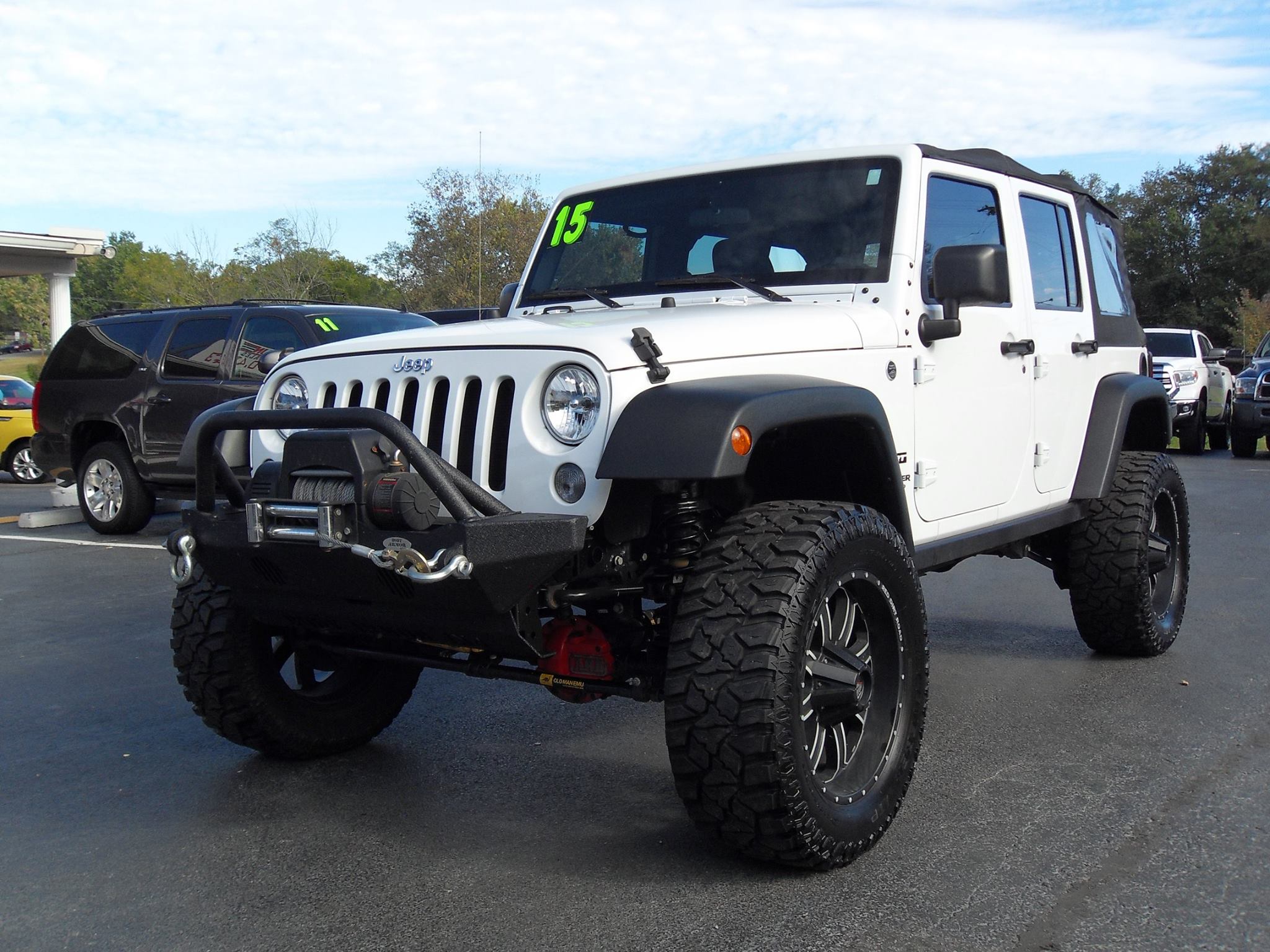 This Jeep is a real head turner. 2015... - Top Gun Auto Sales