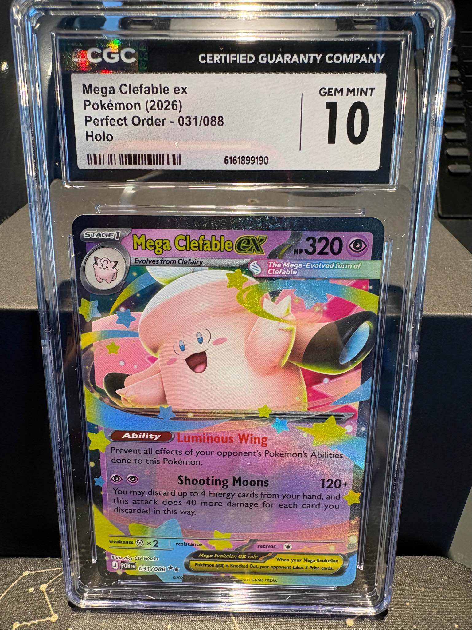 Graded Pokémon trading card is a CGC Gem Mint 10 Mega Clefable ex