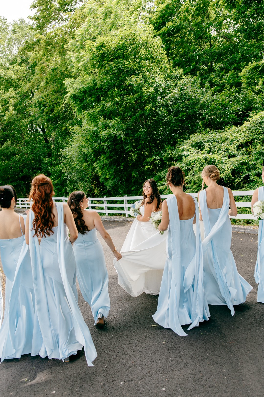 Something Blue. 💙✨ Loving this coastal wedding celebration featuring the Eileen Dress in Mist Blue Matte Satin, Esther PJs in Mist Blue, and @birdygreysuits Taylor Suit in Navy. Bride: @megan_boudre