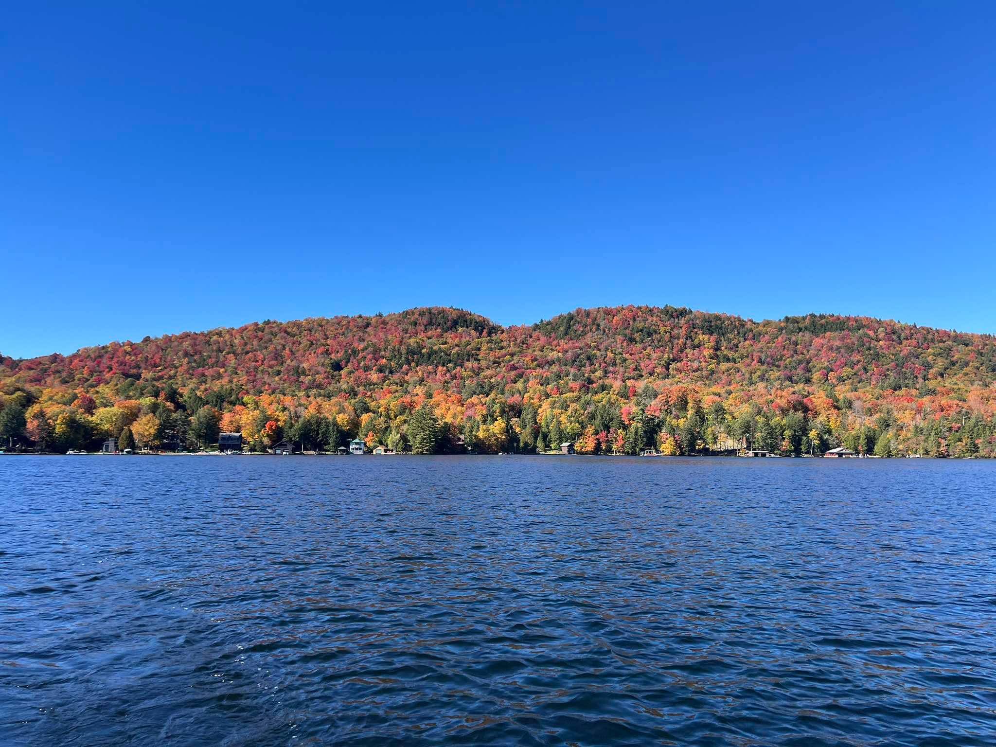 Adirondack fall colors on Fourth Lake by Kirk Ringdahl.