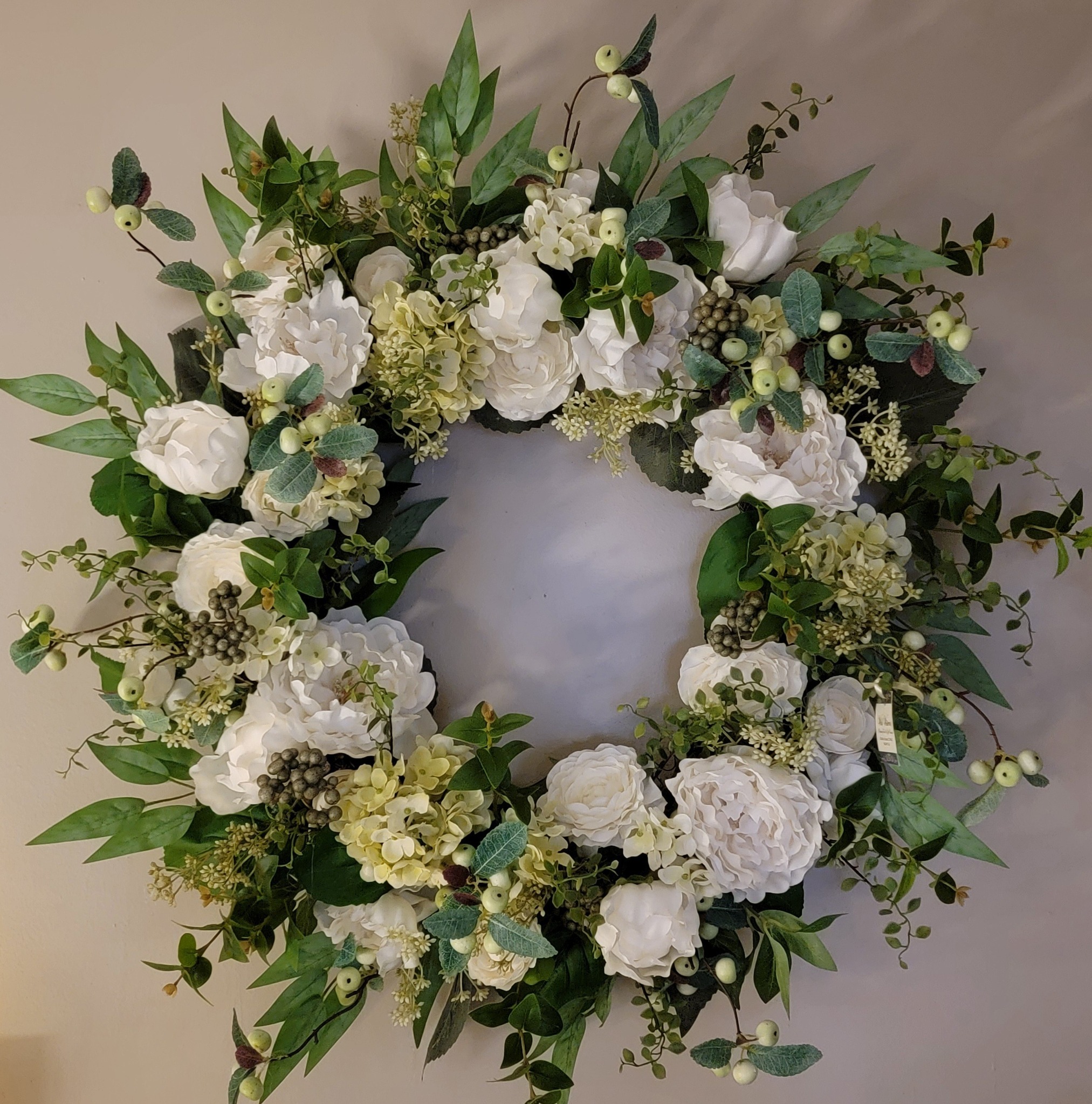 Wild - We've started our Spring wreaths to add a little sunshine to ...