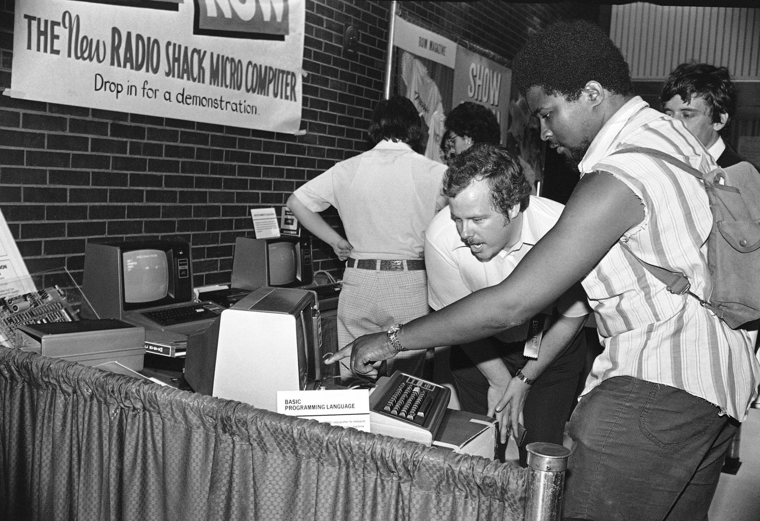 TRS-80 - Don French, left, shows one computer to Dwayne Bey of ...