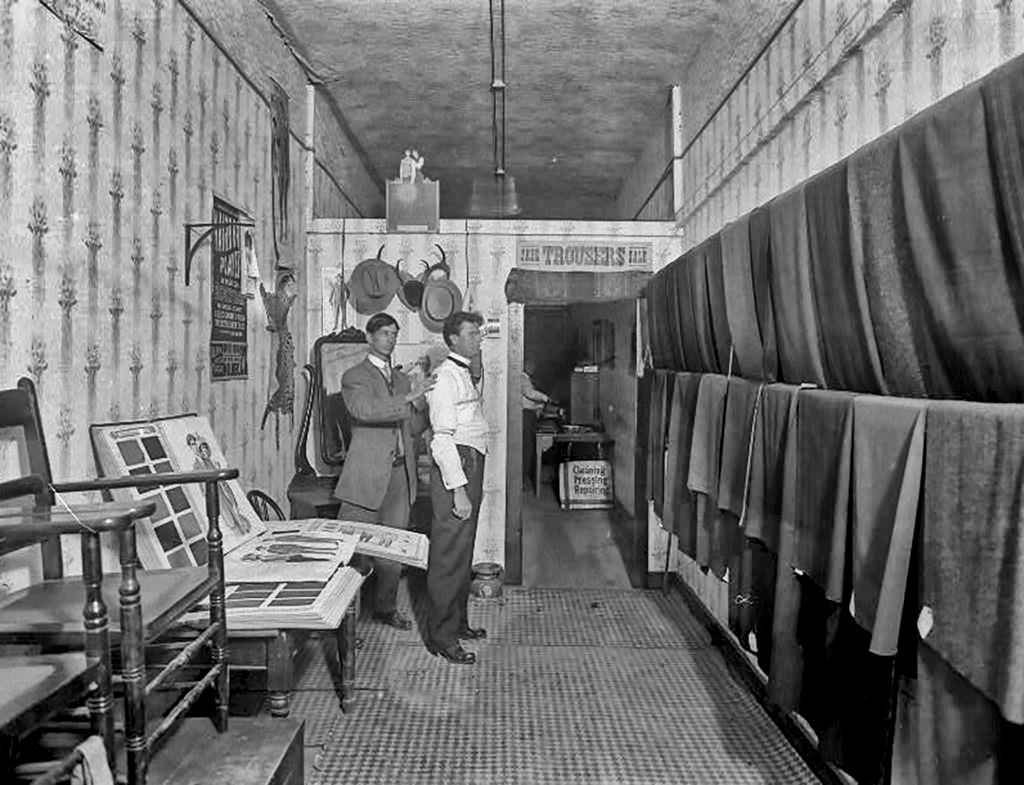 Tailor making a suit in early 1900s America