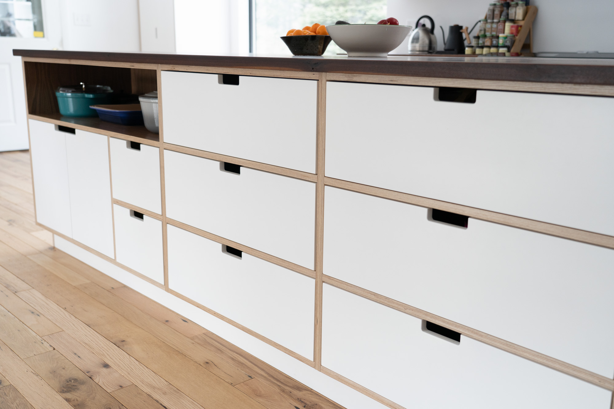 NorthWoods - Painted inset slab drawer fronts with notched pulls makes ...