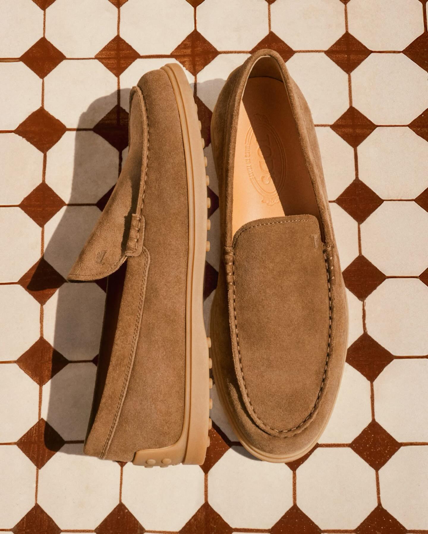 ACOU since 1921 - New TOD’S season in store, discover all... | Facebook