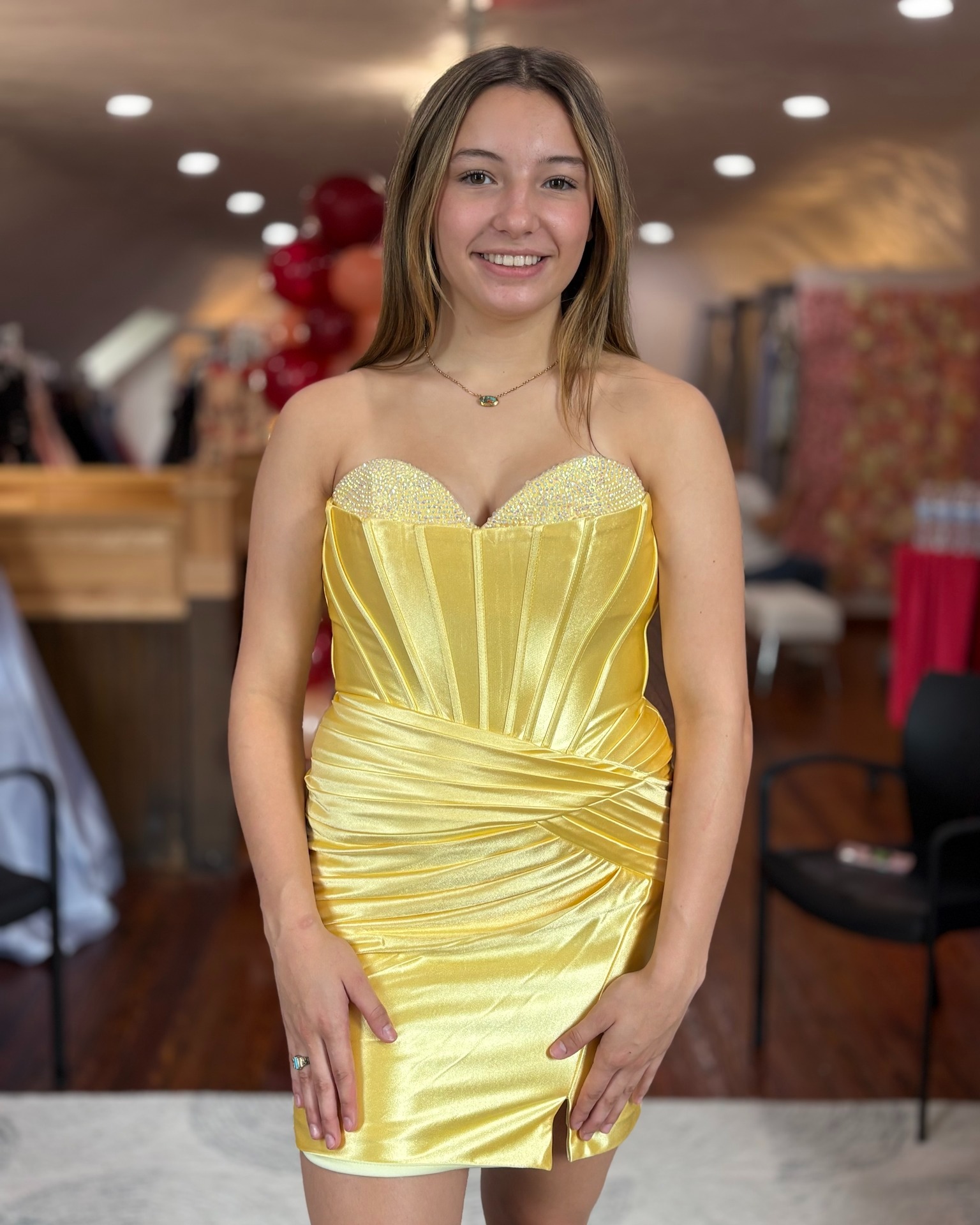 A little sunshine with a little sparkle ☀️✨ This butter yellow beauty features the prettiest peekaboo gem detail for the perfect touch of glam 💛💎 #Adornd #Homecoming #HocoDress #ButterYellow #YellowDress #Homecoming2026 #Hoco2026 #