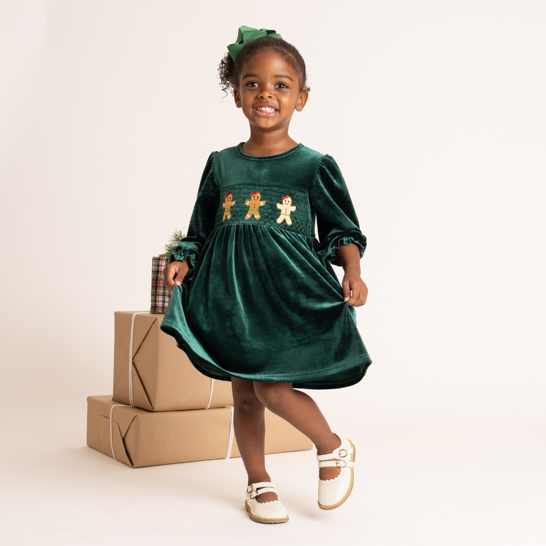 emerald holiday dress 🎄✨ A little magic in every detail! ✨🎄⁠ ⁠ Our Deep Smocked Gingerbread Velvet is made for all the sweetest Christmas moments. 💚 Featuring rich emerald velvet, delicate smocking, a sequence lehenga