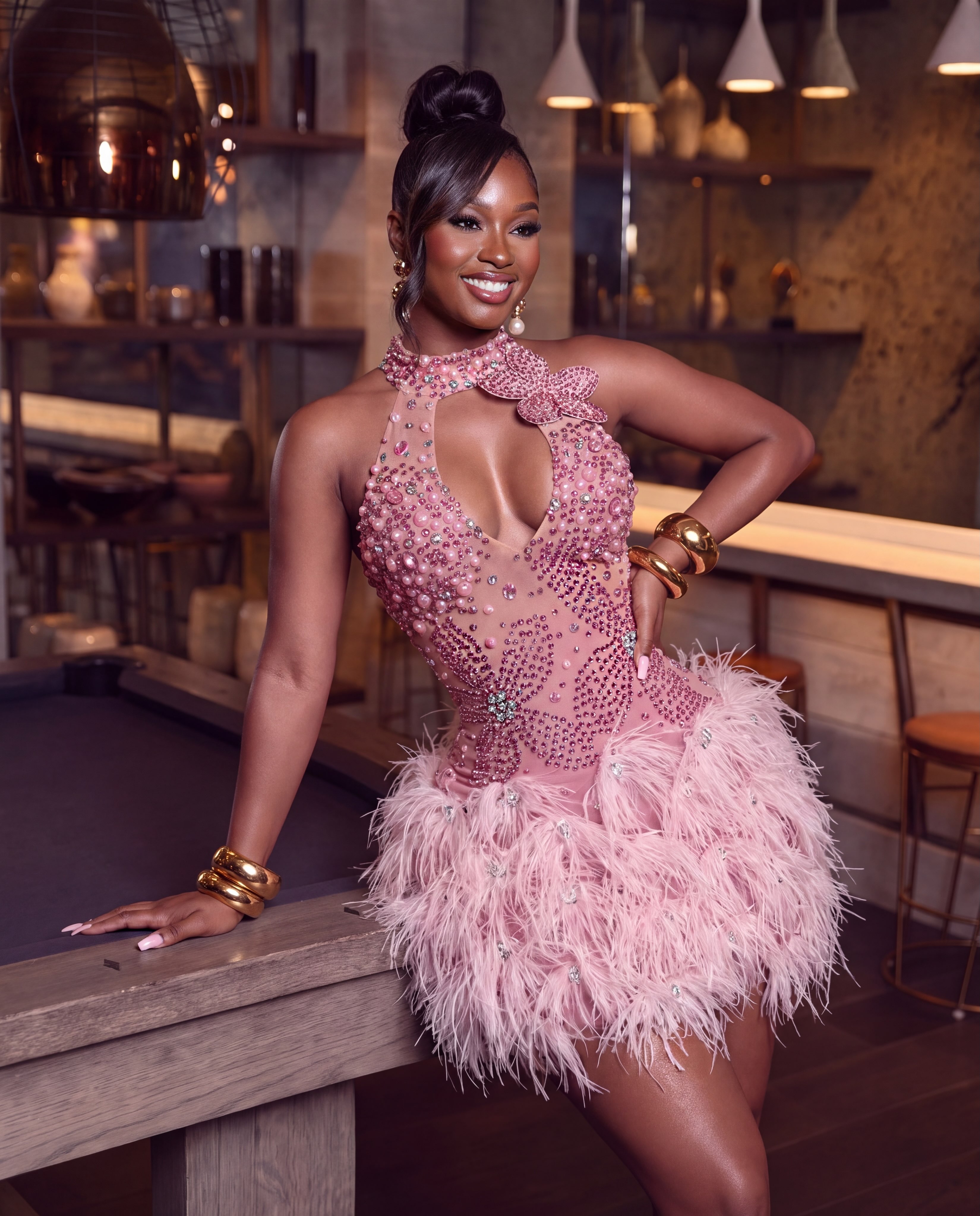 The ultimate birthday girl 💕 🛍️ https://www.naluboutique.com/collections/new-arrivals/products/iconic- feather-crystal-dress