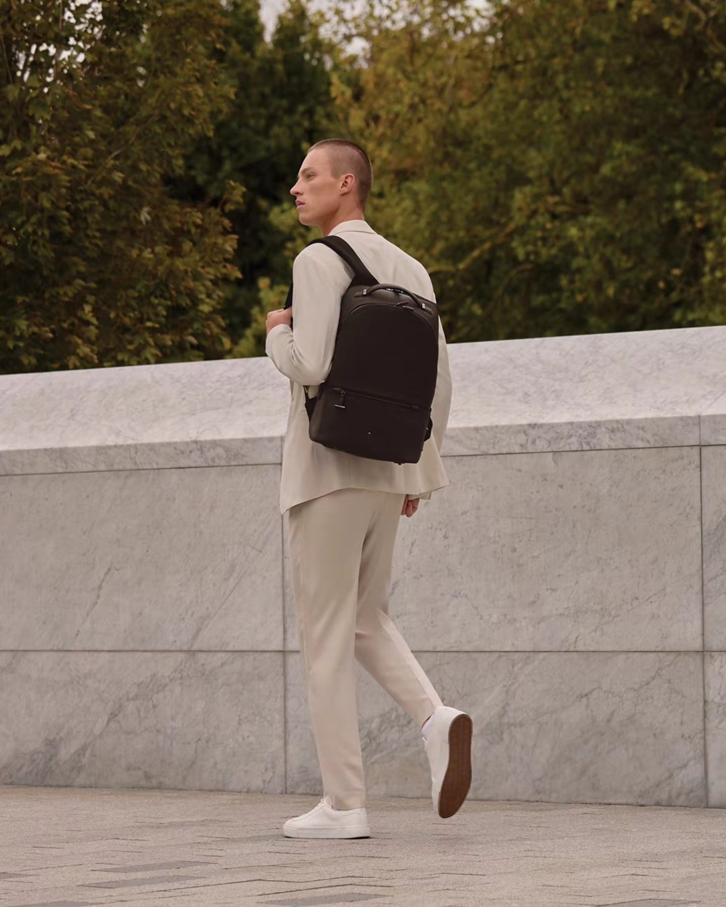 brown leather backpack with black shoes For Men | 16" Laptop Backpack | Leather College Backpack it ensures that every tool for success finds its rightful place and offering ample storage options that bring order to the chaos of daily life.It includes adjustable shoulder straps with a leather cushioned pad Brown Leather Backpack with Suit