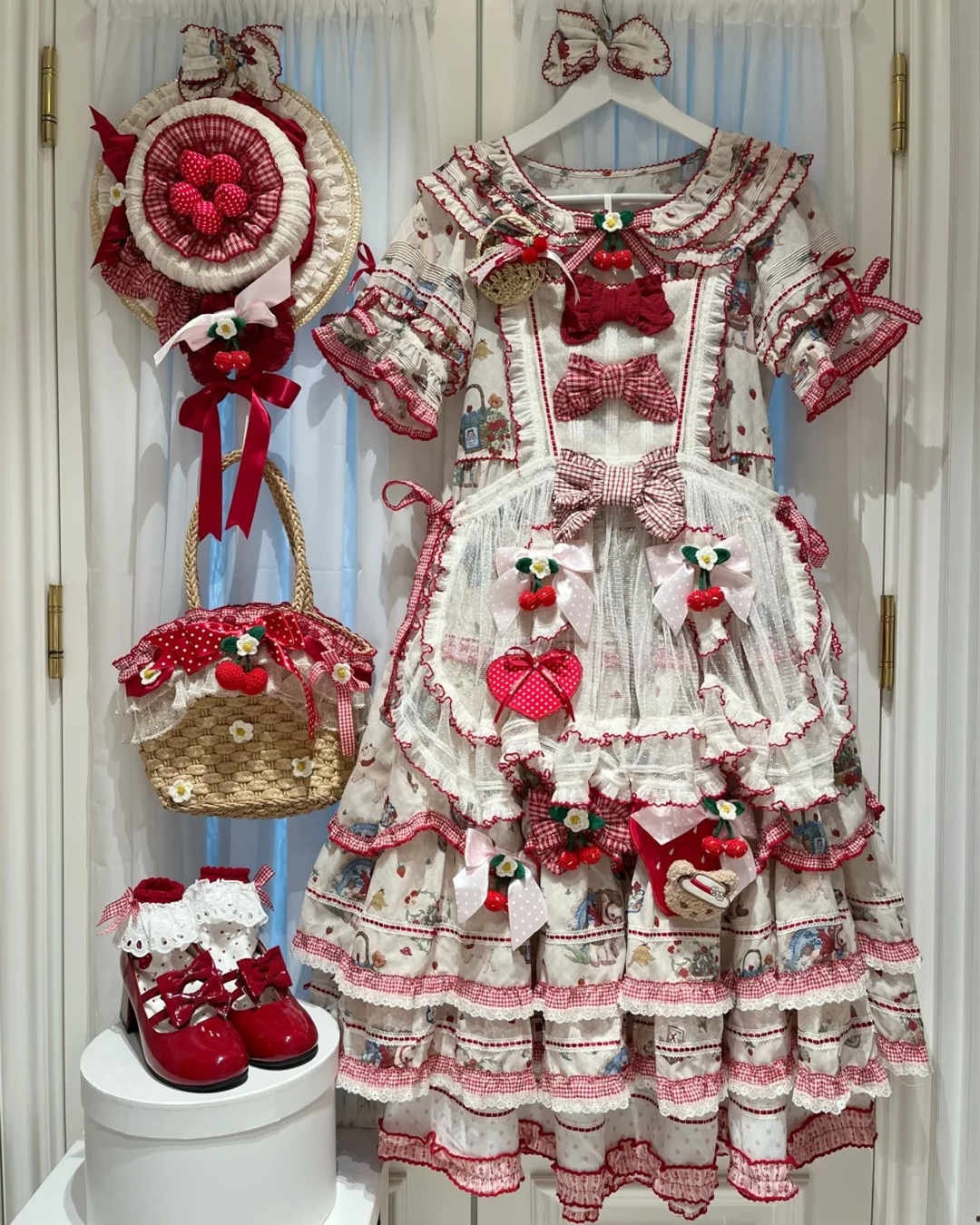 🍓🌿 Strawberry and cherry details, layered ruffles, and soft cottagecore colors create a sweet Lolita atmosphere full of countryside charm. Available in beige & red, blue & red, and pink & red