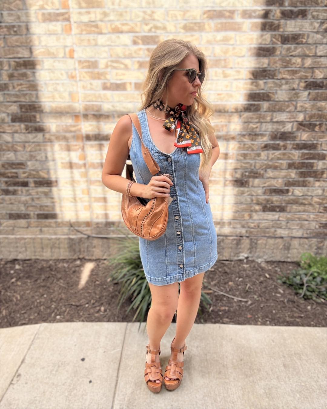 One dress. Endless compliments. ✨ Our Z Supply denim dress styled with Bed|Stü accessories is giving timeless with a touch of western charm. Dress ➡️ https://marlenesassandclass.com/collections/mini