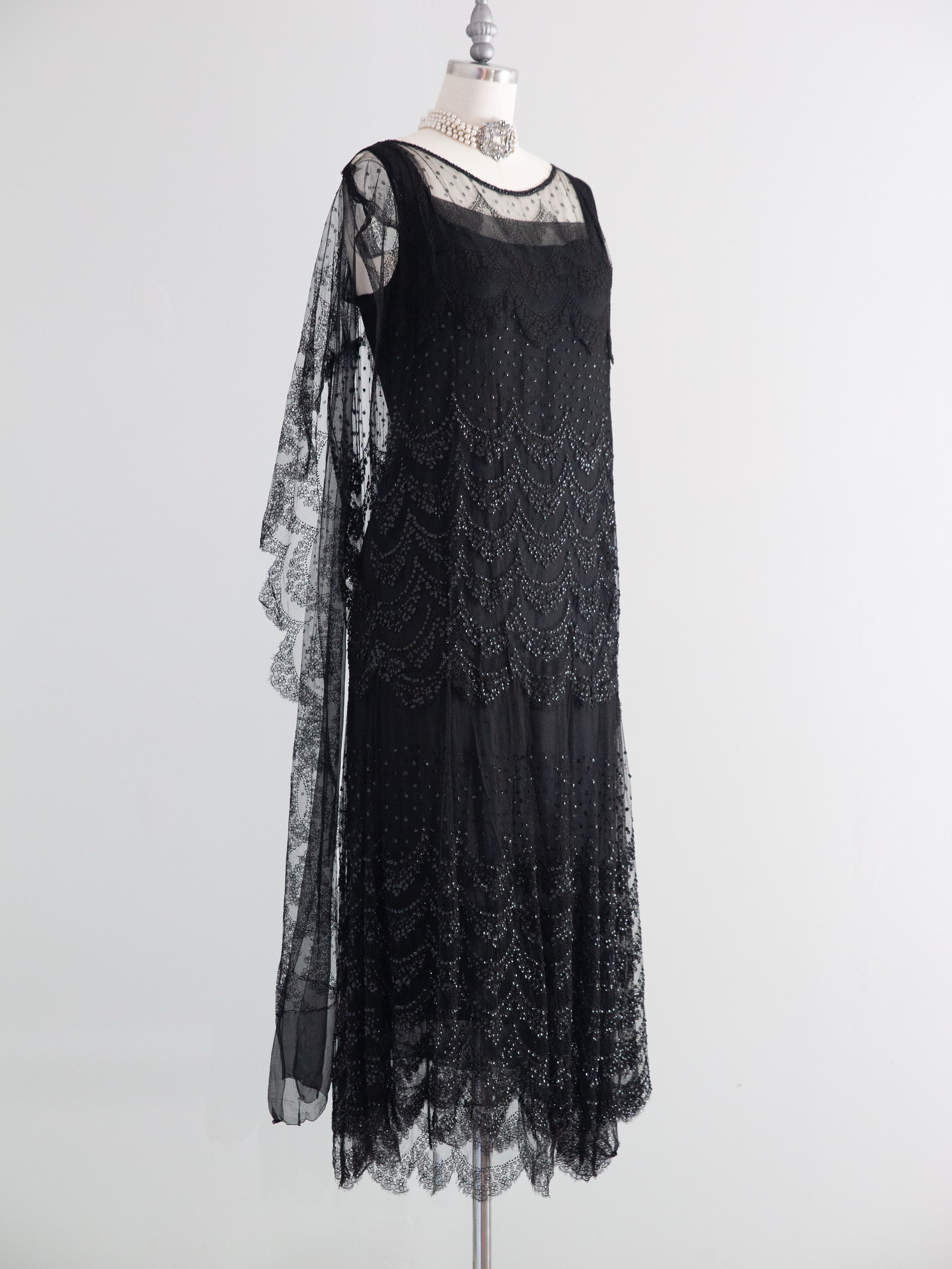drop waist dress 1920s Grey with tiered skirt and rhinestones that runs from one side of the waist around the back to the other side Drop Waist Dress 1920s Style