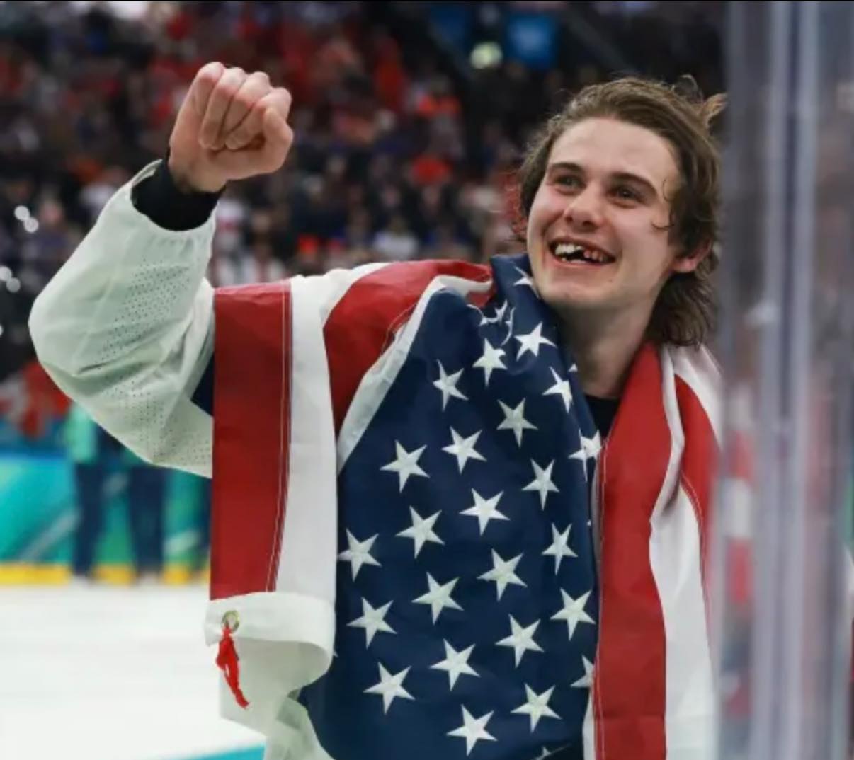 Sean - Teeth knocked out. But gold medal on his neck. THIS ICONIC PHOTO ...