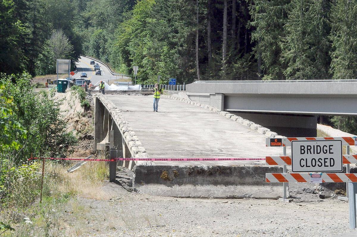 Peninsula - PHOTO: Bridge removal https://www.peninsuladailynews.com ...