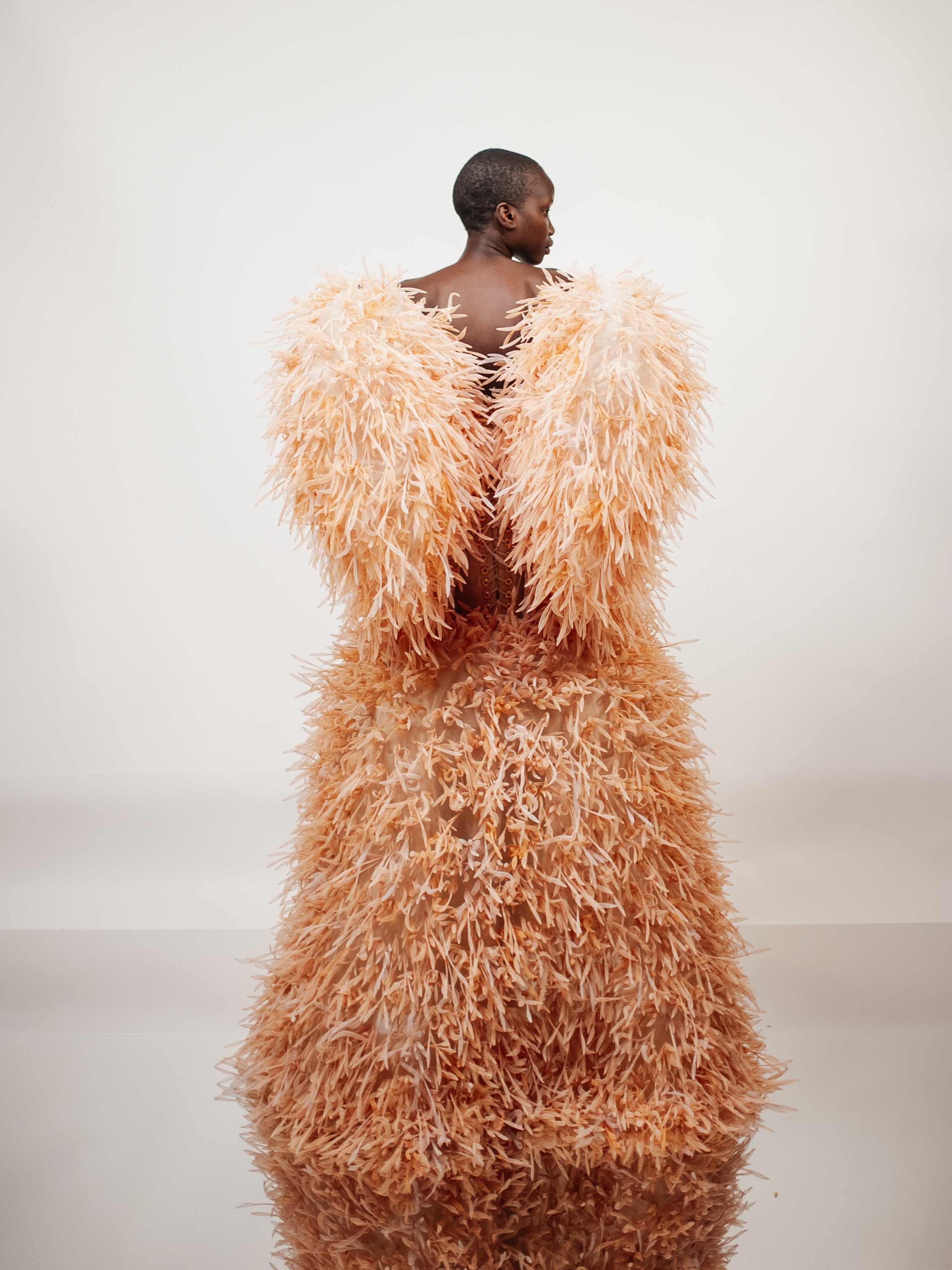 jersey covered dress form ANOK CORAL The “Walking Coral” required more than 7,000 meters of crin and 9850 hours of work. It features a form-fitting bustier made of coral-colored jersey, in coral-colored lacquered silicone collection::new markdowns