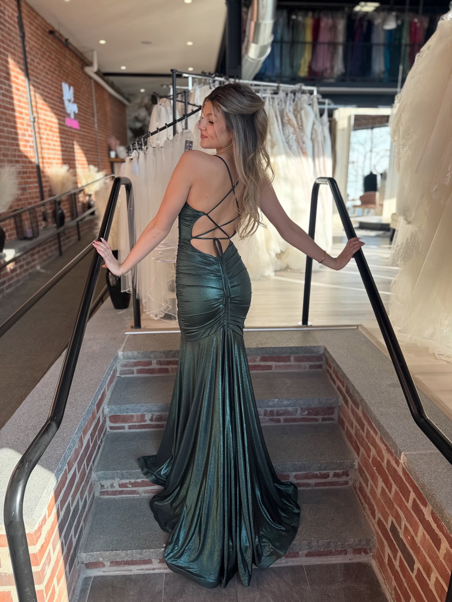 A moment for this stunning open corset back on this NEW 2026 @lafemmefashion arrival!! This emerald green color is perfect for #prom2026 !!👗💐💚✨ #promdress #promsoon #promstore