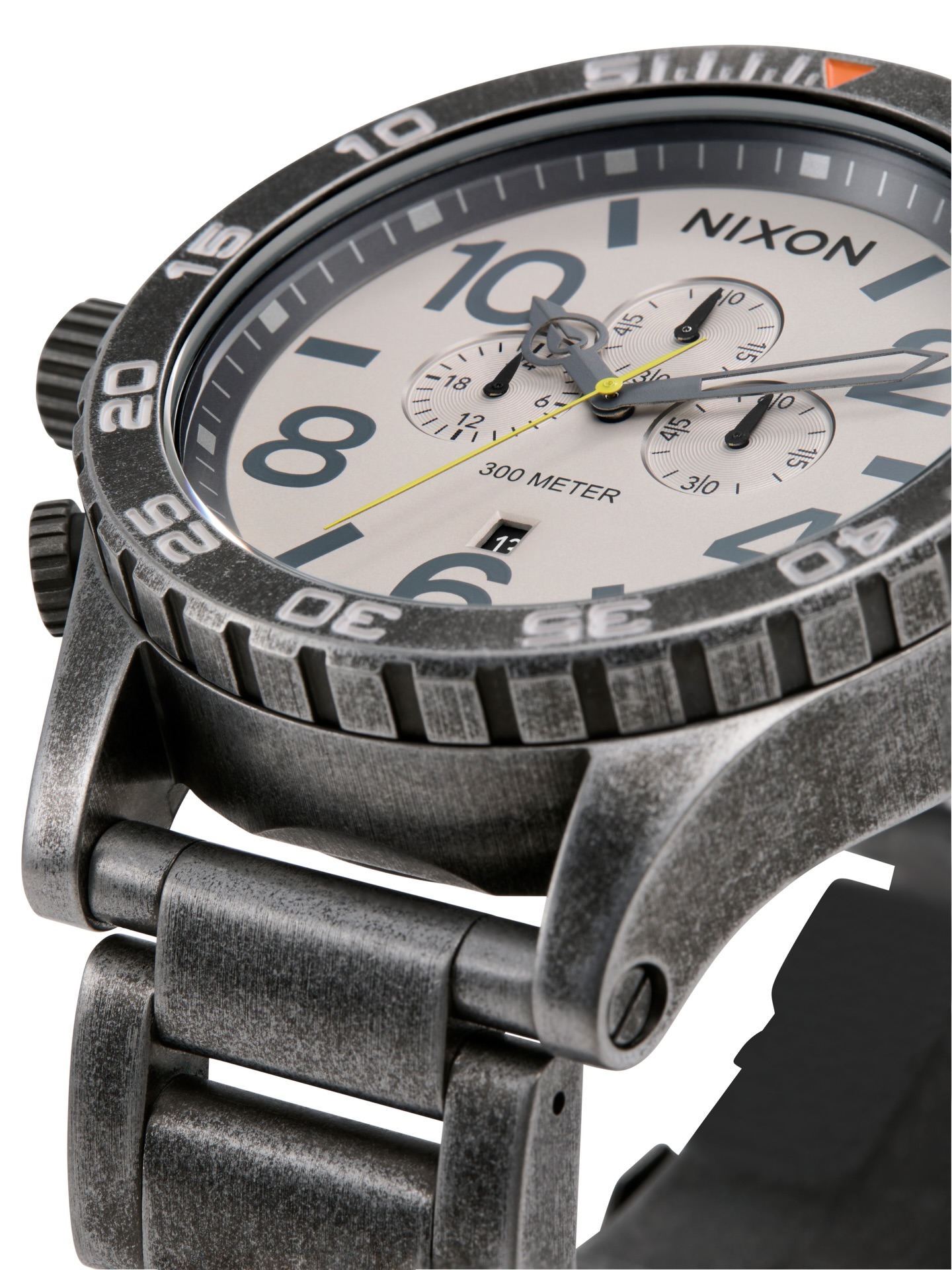 Not polished. Not precious. As tough on the wrist as it is in the 