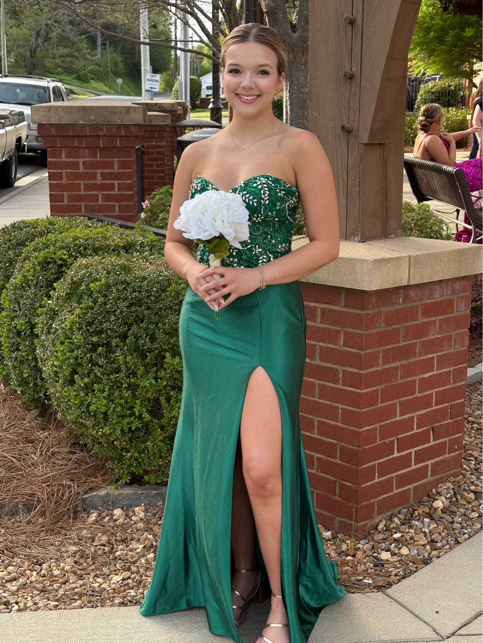 Emerald green prom dress, size 8. Altered to allow the train to be removable. Pictures show with and without train on dress. Shipping additional